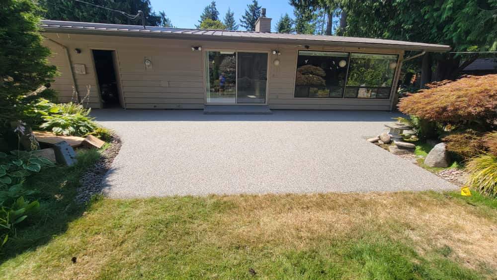 Monticello Sanctuary: A Patio of Refined Tranquility by Concrete Coating Experts Inc.