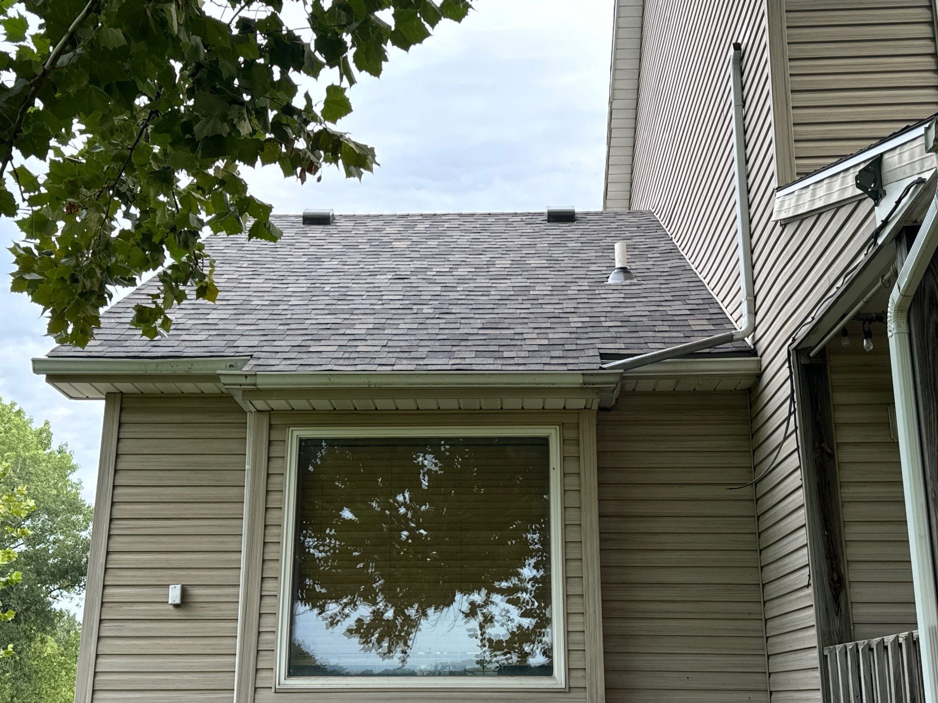 Comprehensive Residential Roof and Siding Replacement in Smithville Missouri by EEC Windows, Siding & Roofing