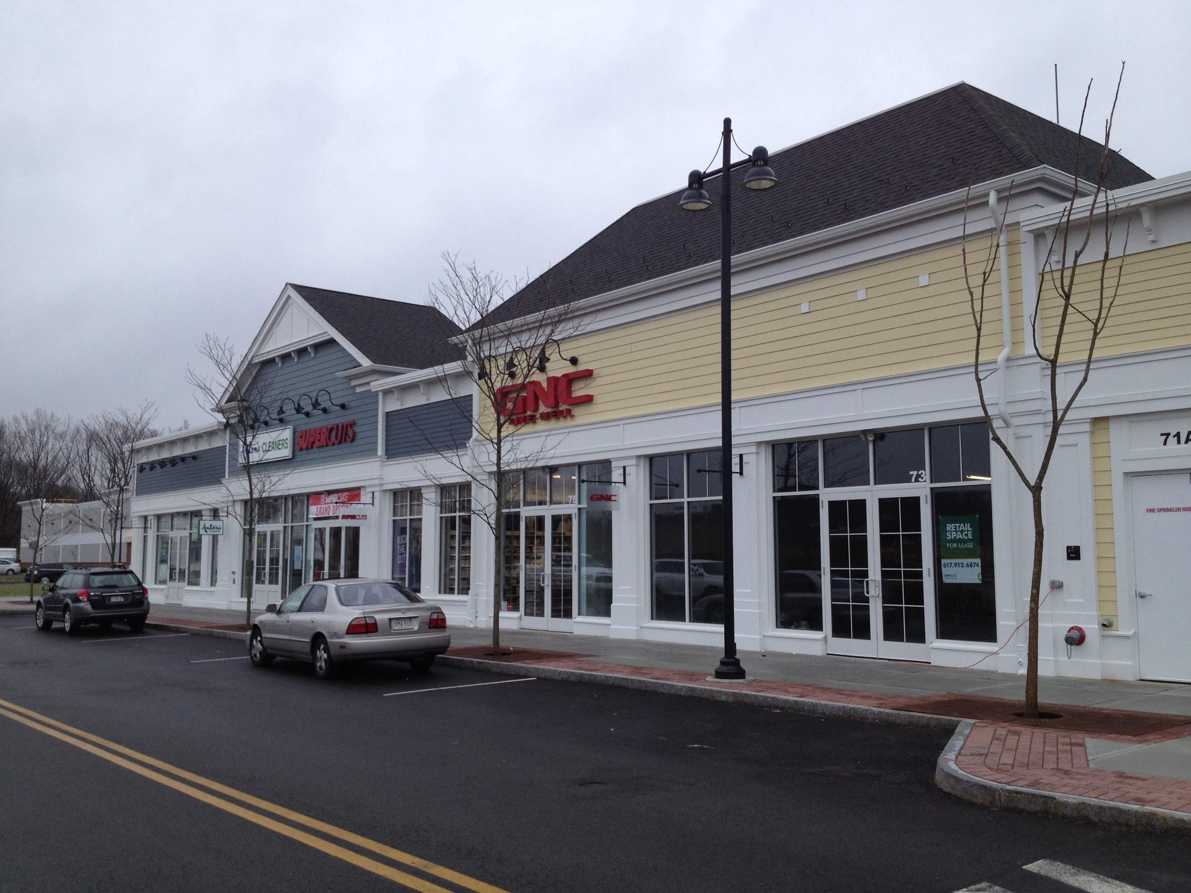 Commercial Gutter System at Wayland Town Center by Gutter Pro Enterprises