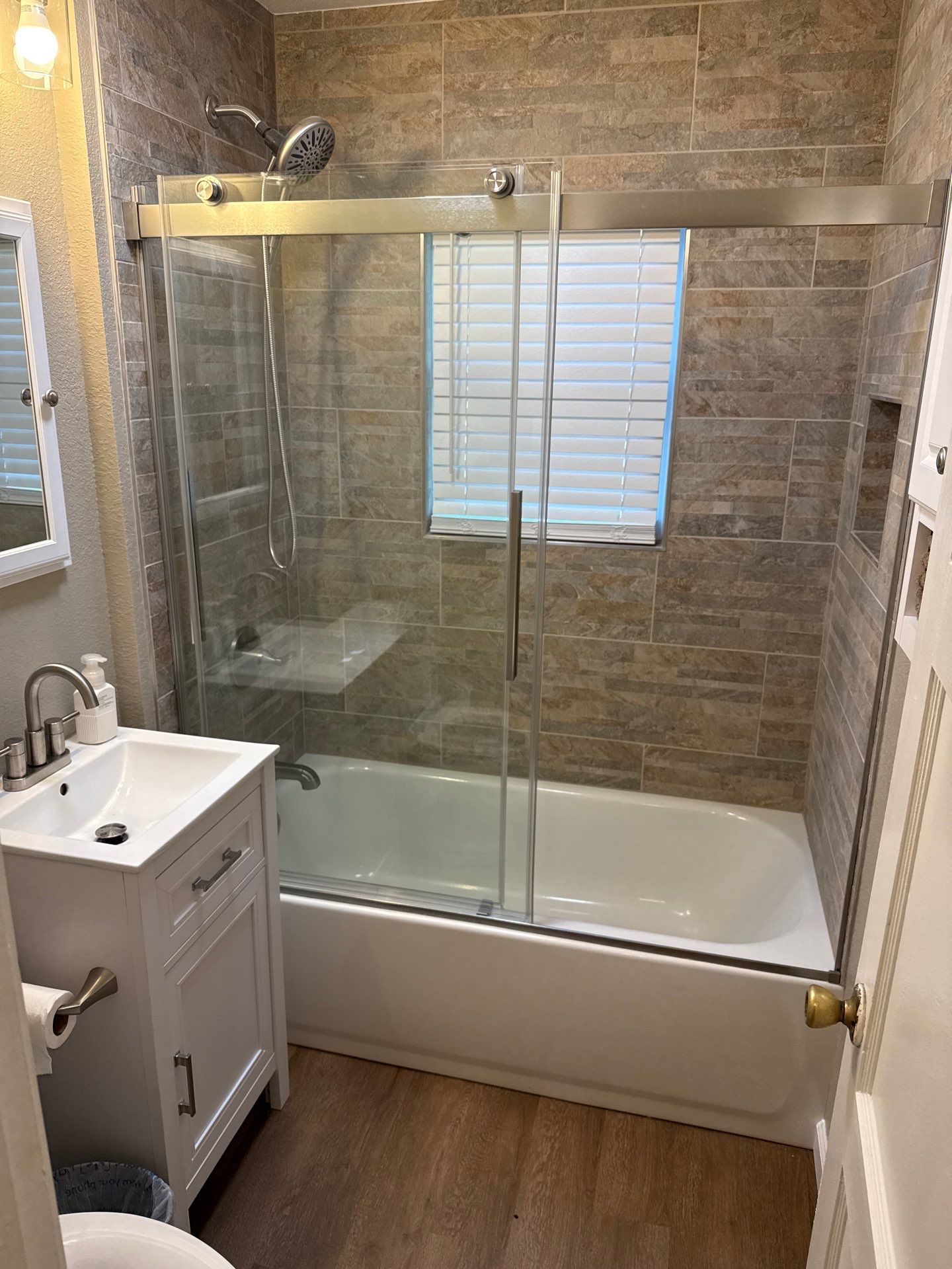Beautiful Bathroom Remodel by In & Out Construction & Remodeling, LLC