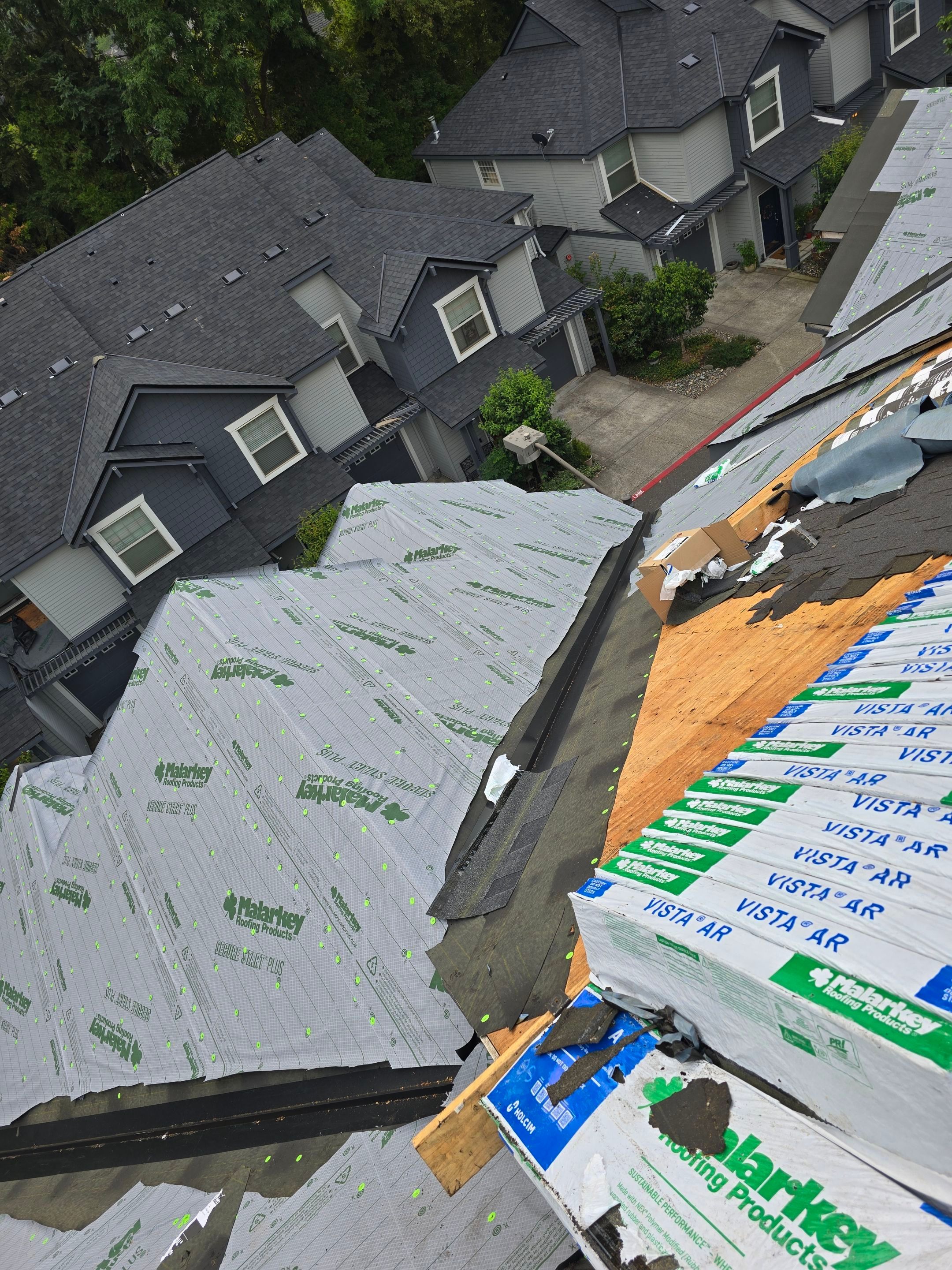 Dawson Station Reroof and Gutters by Hawthorne General Construction