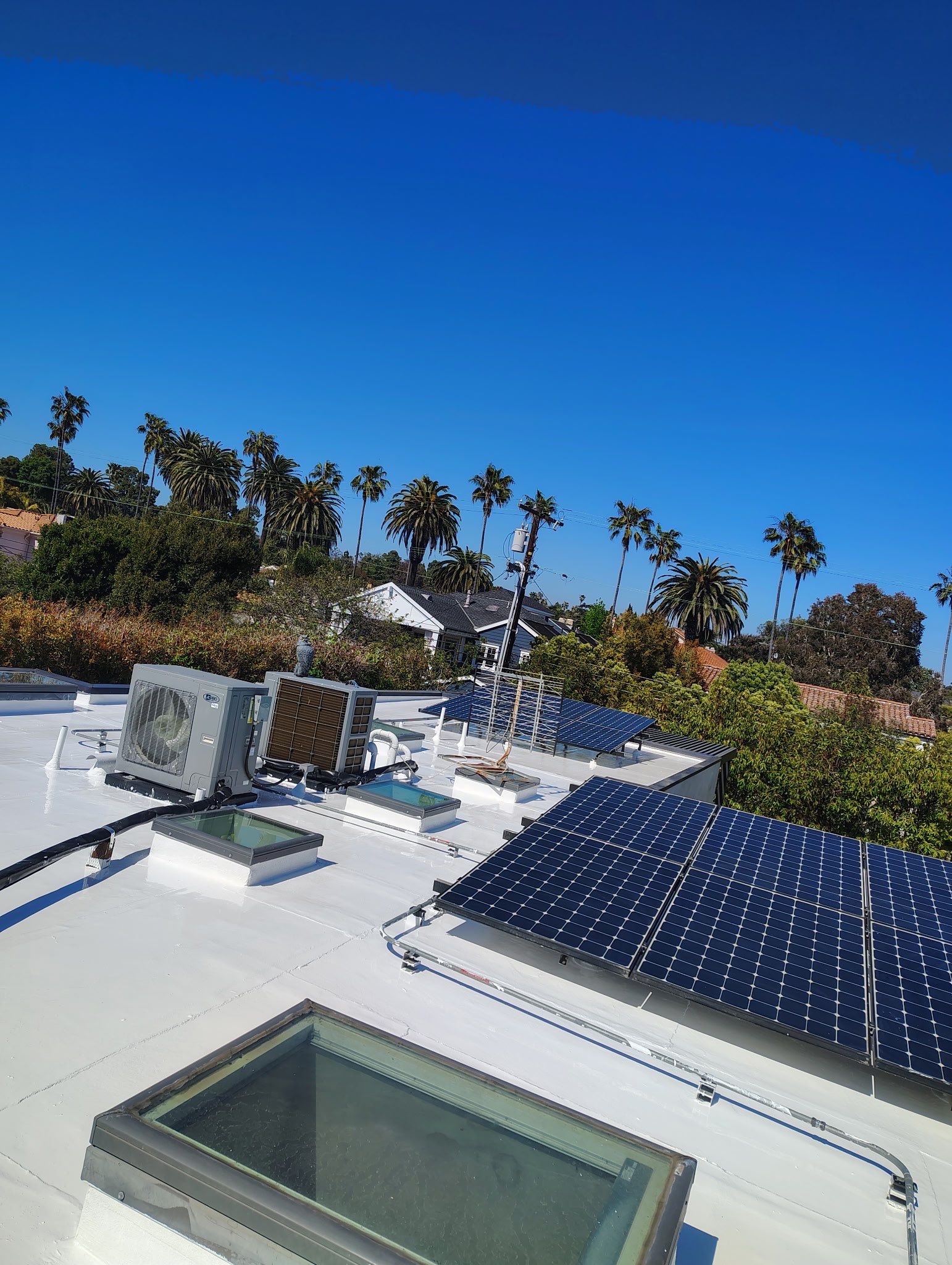 Silicone Membrane Installation using American Standard Coatings Silicone-S by Hull Brothers Roofing