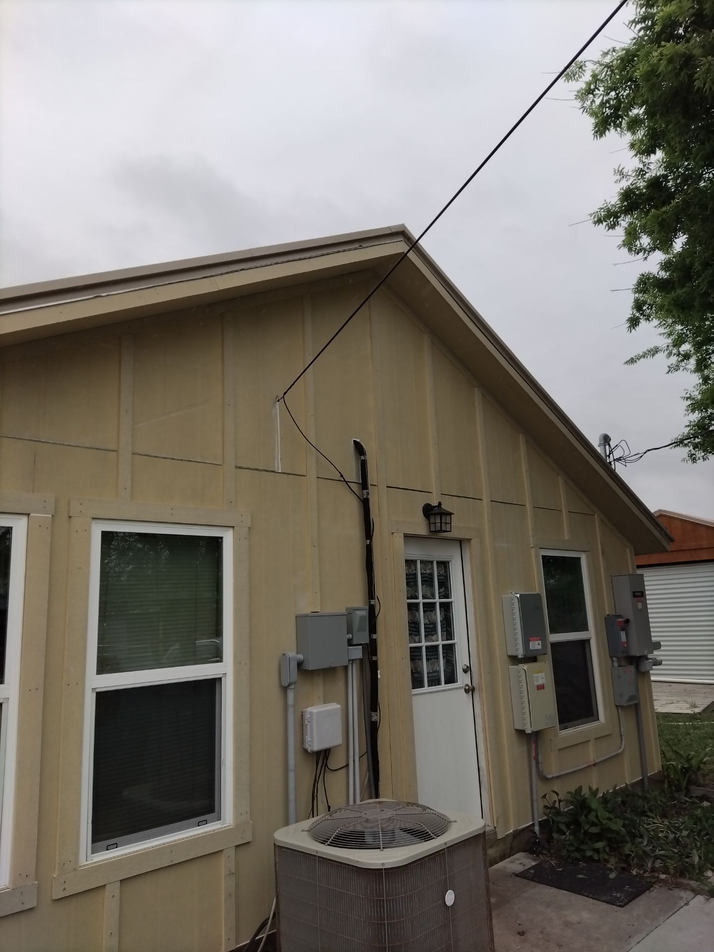 Vinyl to Hardie by Bayfront Roofing and Construction