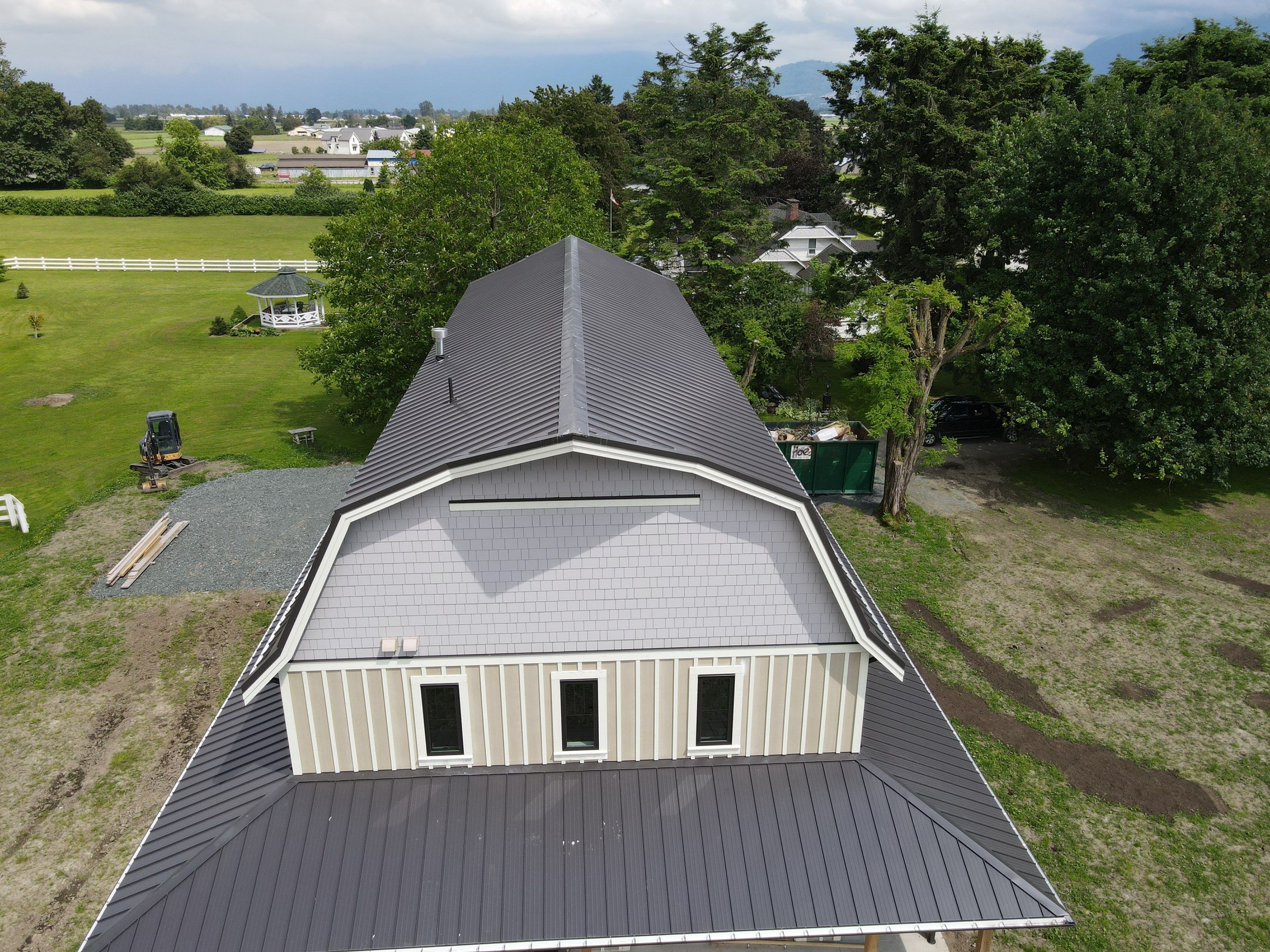 Commercial Roofing Installation using 12" Prolok metal  by Top Notch Roofing Inc