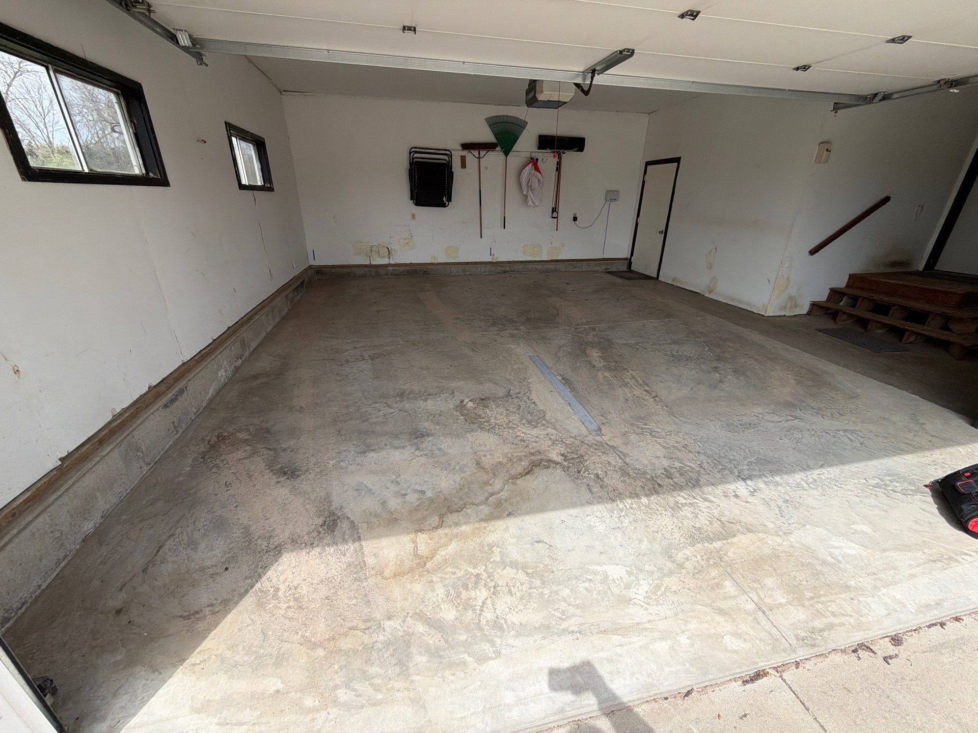 Hartford Residential Garage Floor Transformation With Decorative Chip Coating by Select Painting, Coatings & Garage Cabinets