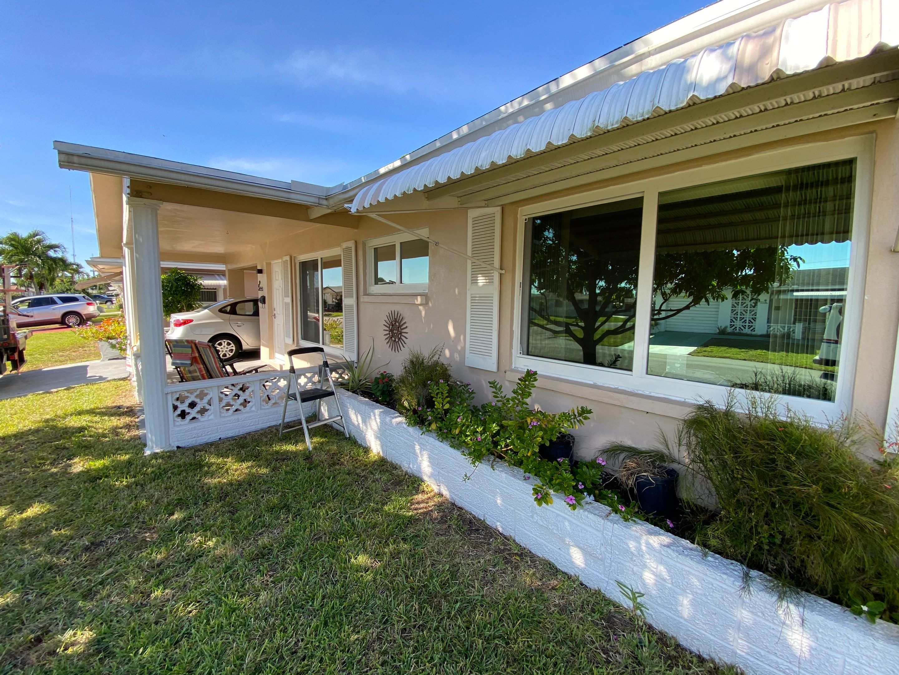 Tamarac Residential Entry Door and Aluminum Window Installation Project by The Door Doctor of South Florida, Inc.