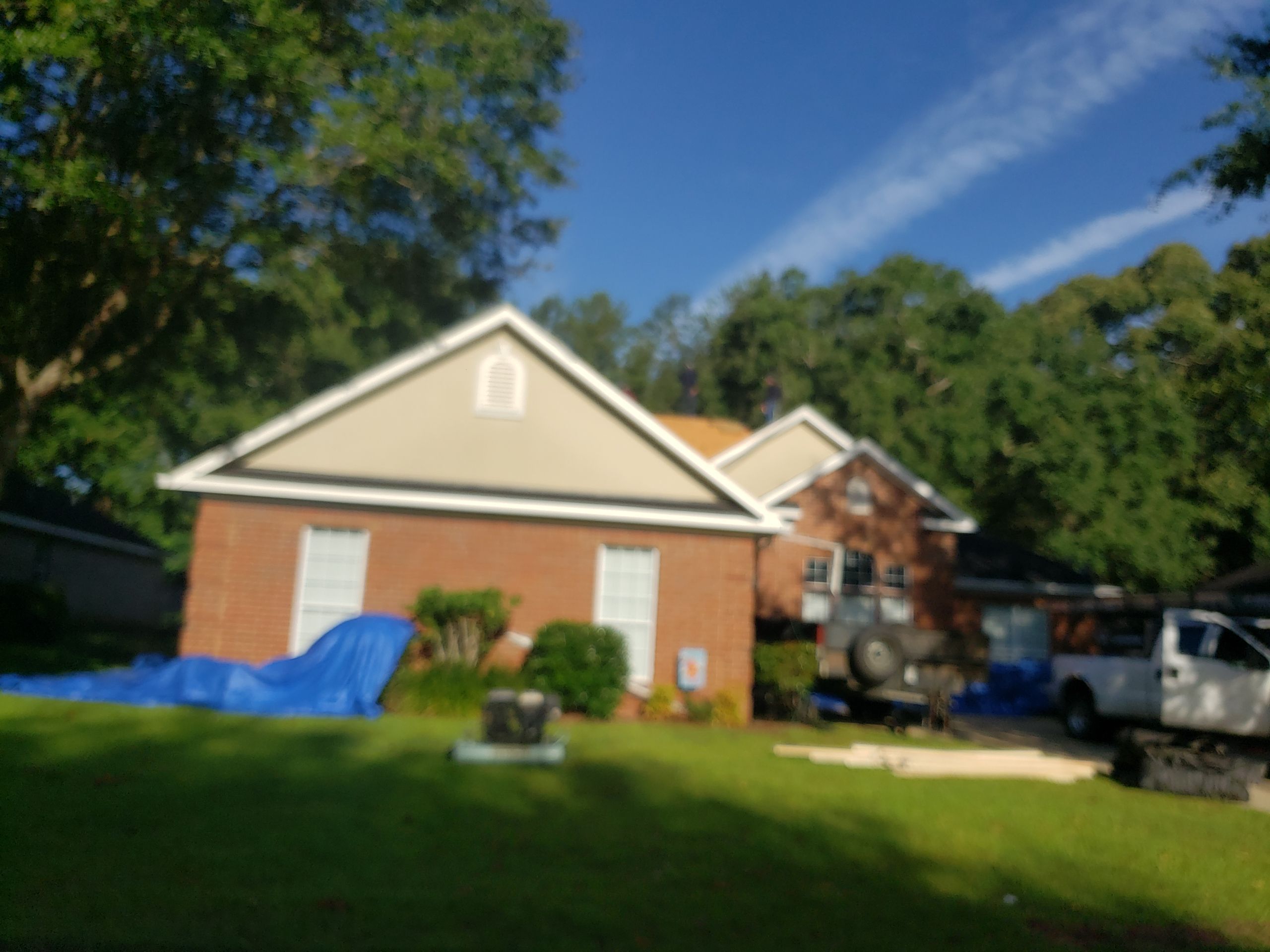 Residential Roofing Installation using Roof Replacement by American Roofing & Construction LLC