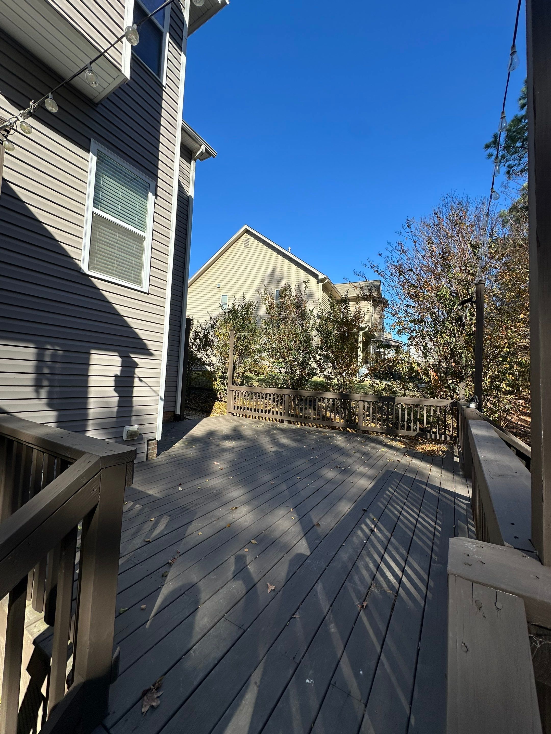 Elevated Screened Porch Addition and Deck Integration in Knightdale by The Remodeling Company