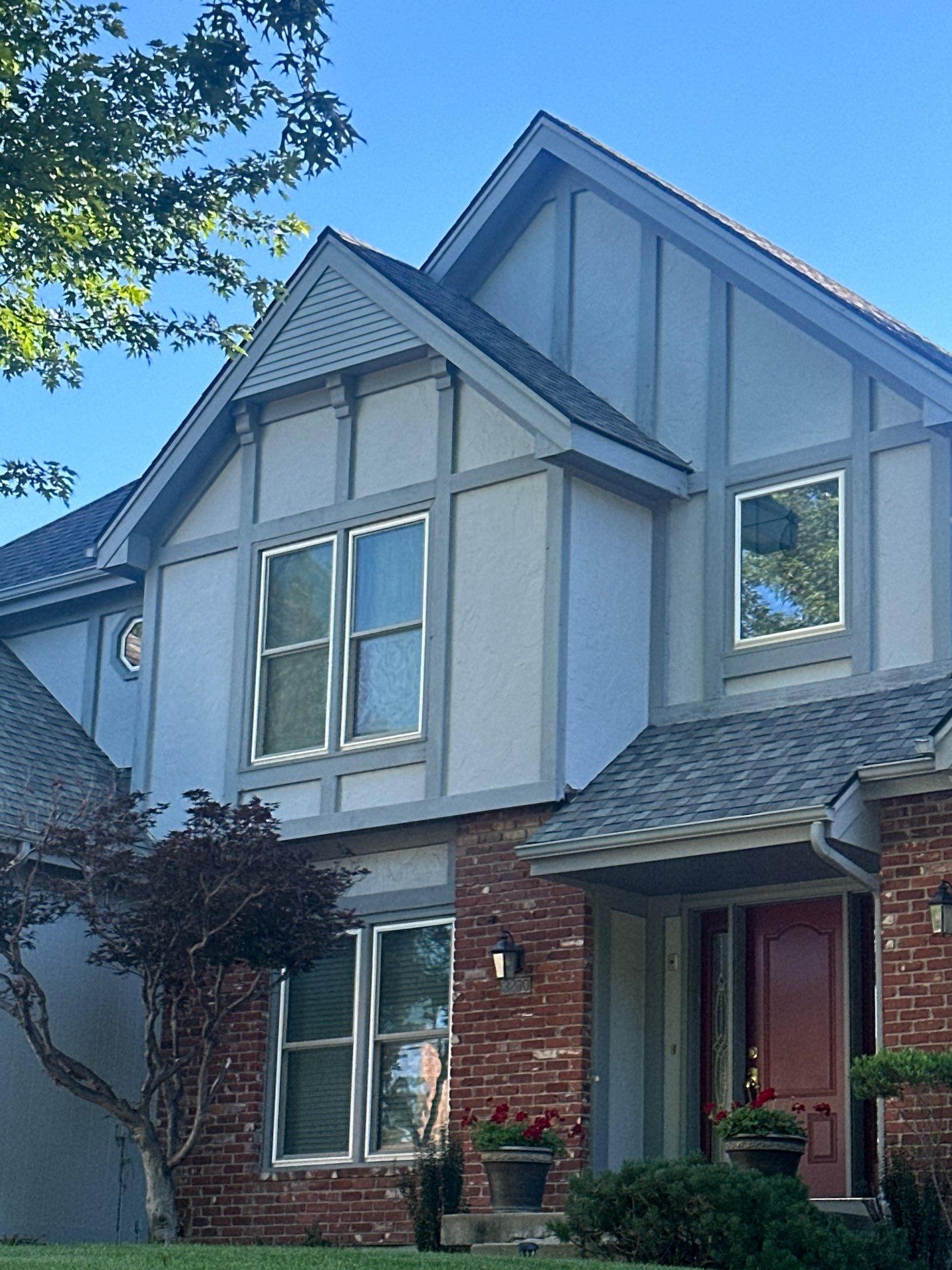 Whole Home Siding Replacement and Gutter Installation in Gladstone by EEC Windows, Siding & Roofing