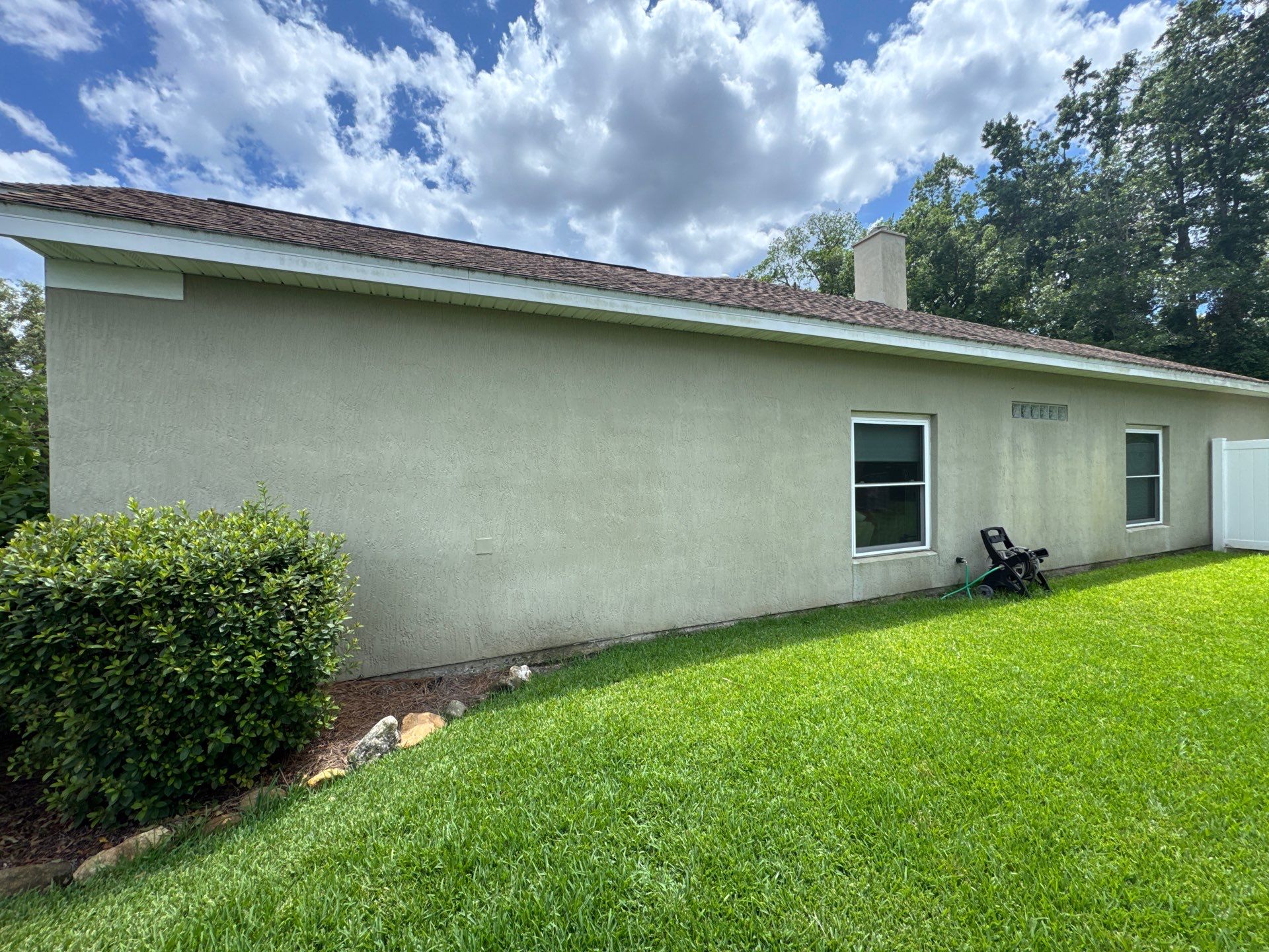 Stucco Exterior Repainting with White Soffits & Fascia | Hampton Park, Jacksonville, FL by A New Leaf Painting, LLC
