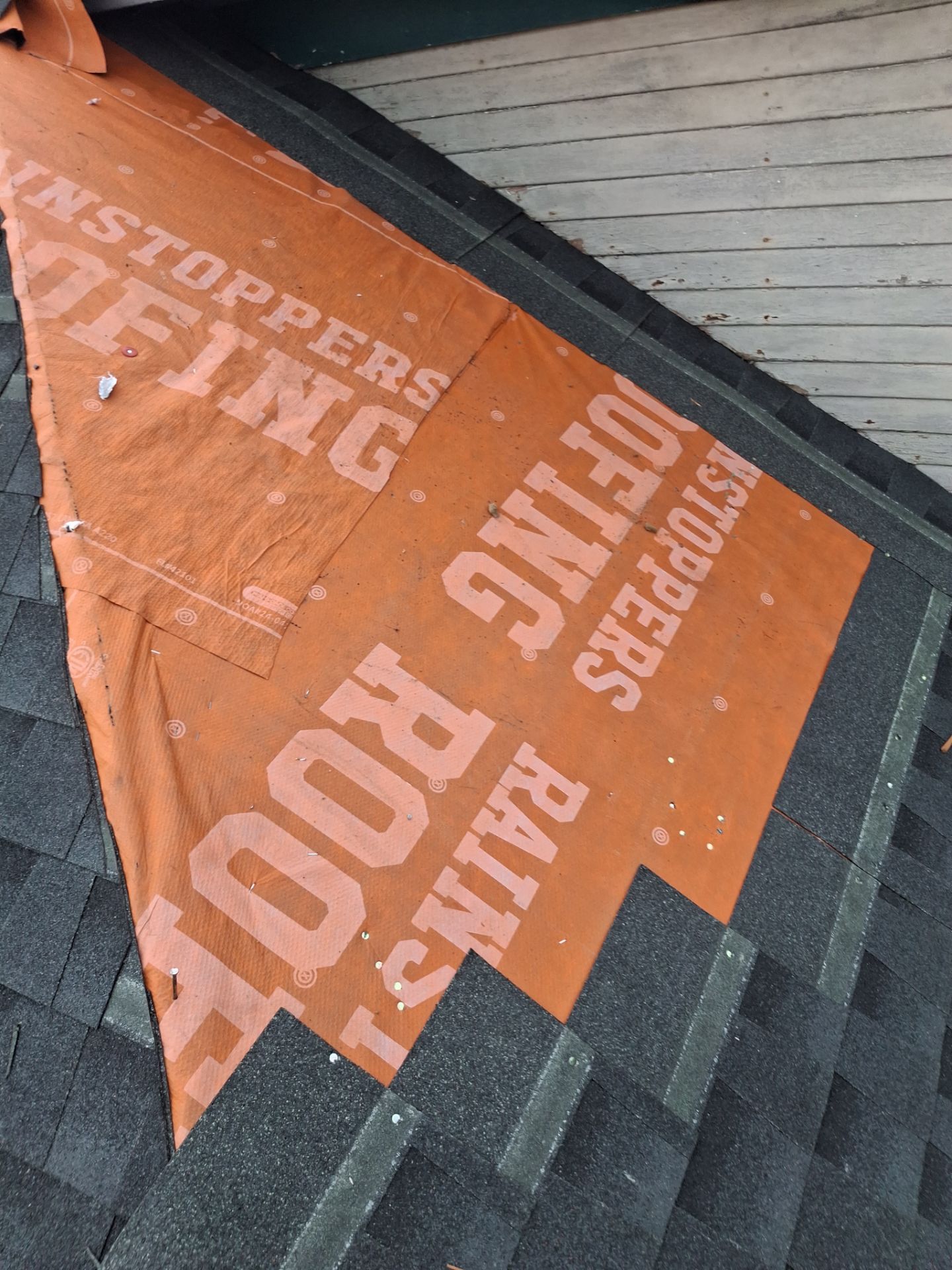 Residential Roofing Installation using GAF Timberline HDZ Charcoal by Rainstoppers Roofing