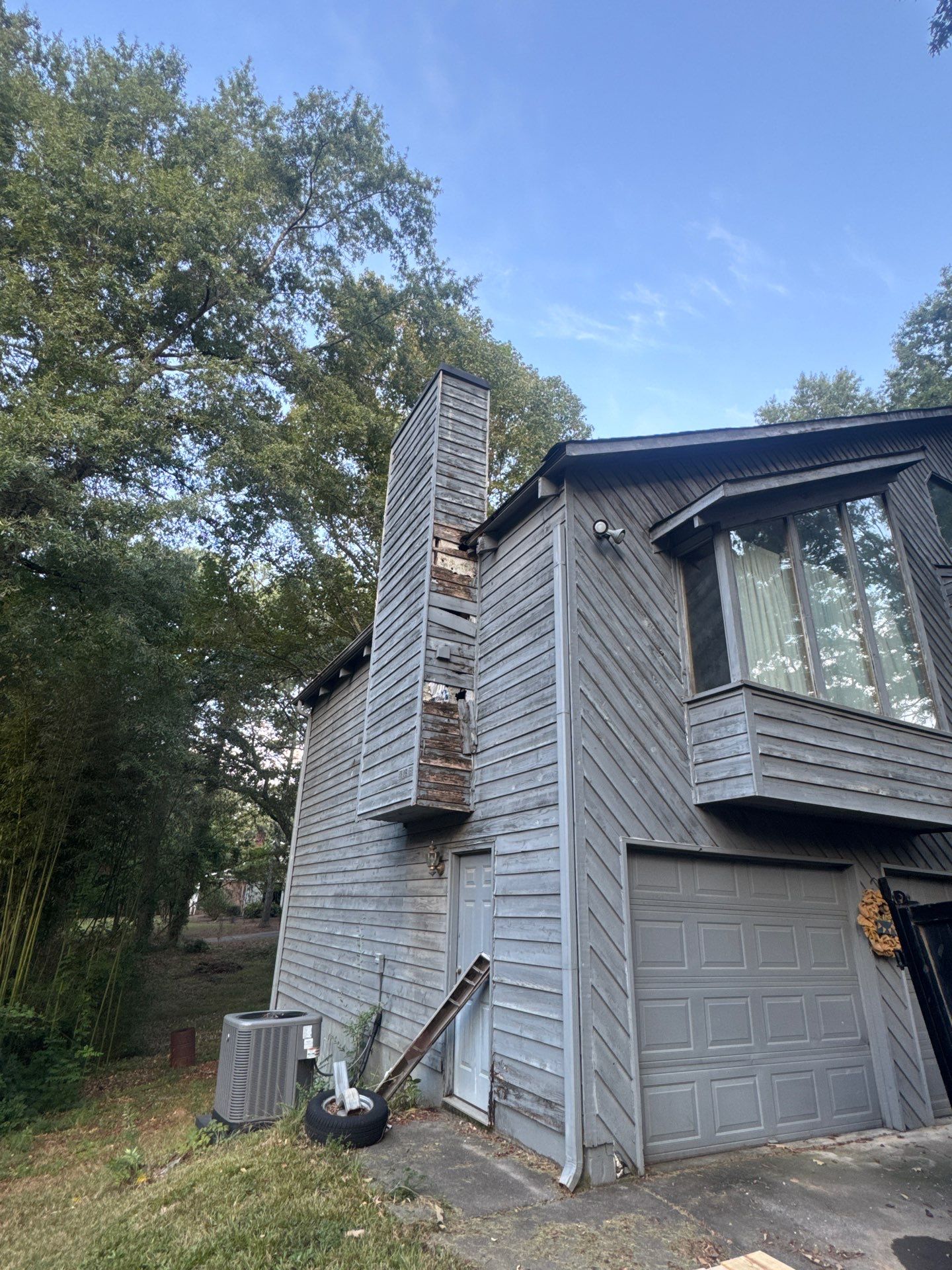 Chimney Chase Siding Replacement and Exterior Painting in Cartersville by Swift Home Renovations 