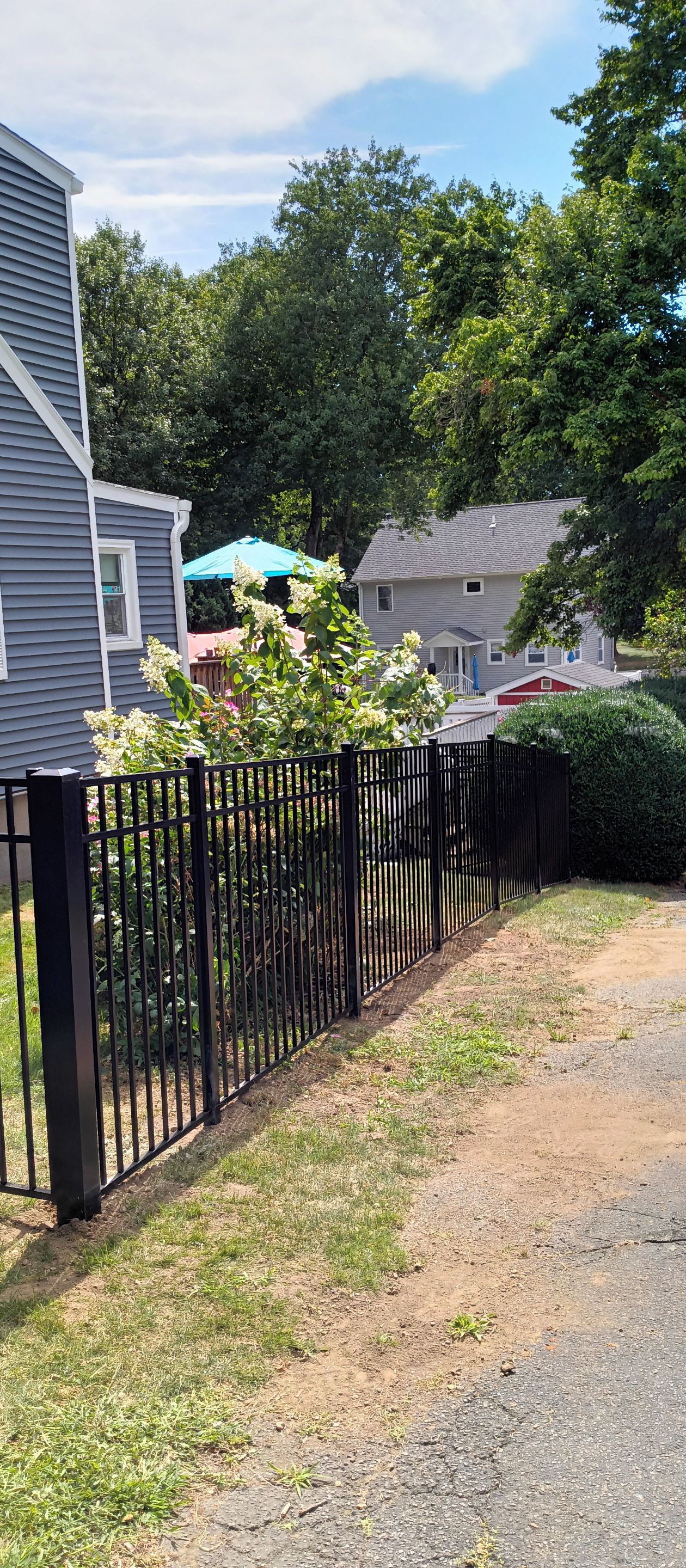 Black Aluminum Fence with matching Gate by DiGiorgi Roofing and Siding Inc