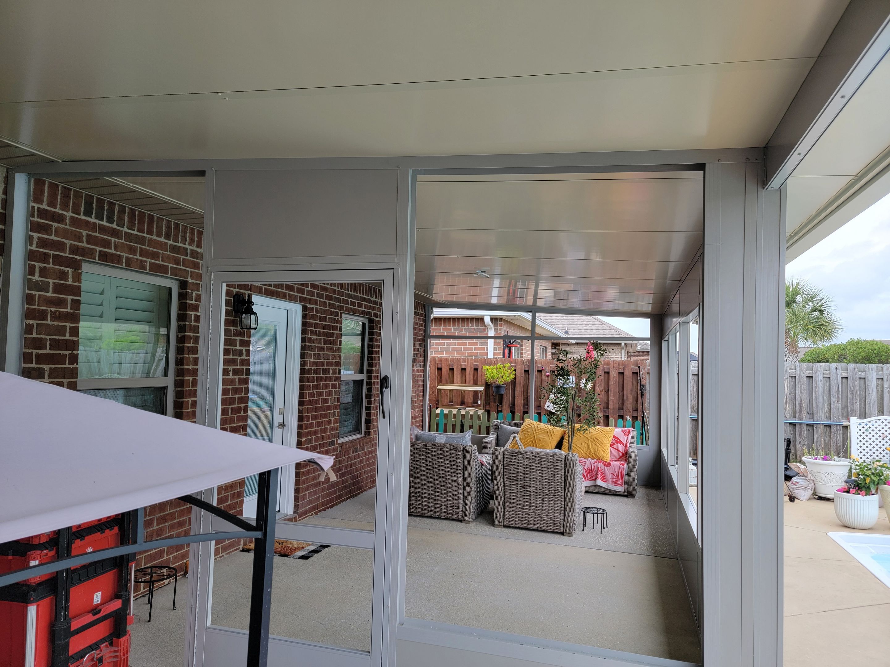 Poolside Screen Room & Patio Cover in Gulf Breeze by Titan Sunrooms