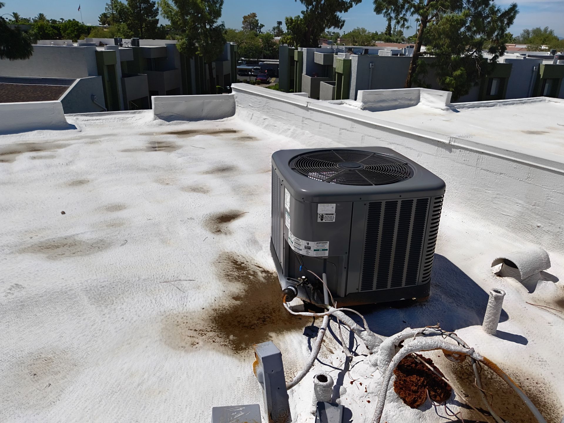 Mesa Apartment Flat Roof Coating and Interior Restoration Services by APM Builders LLC