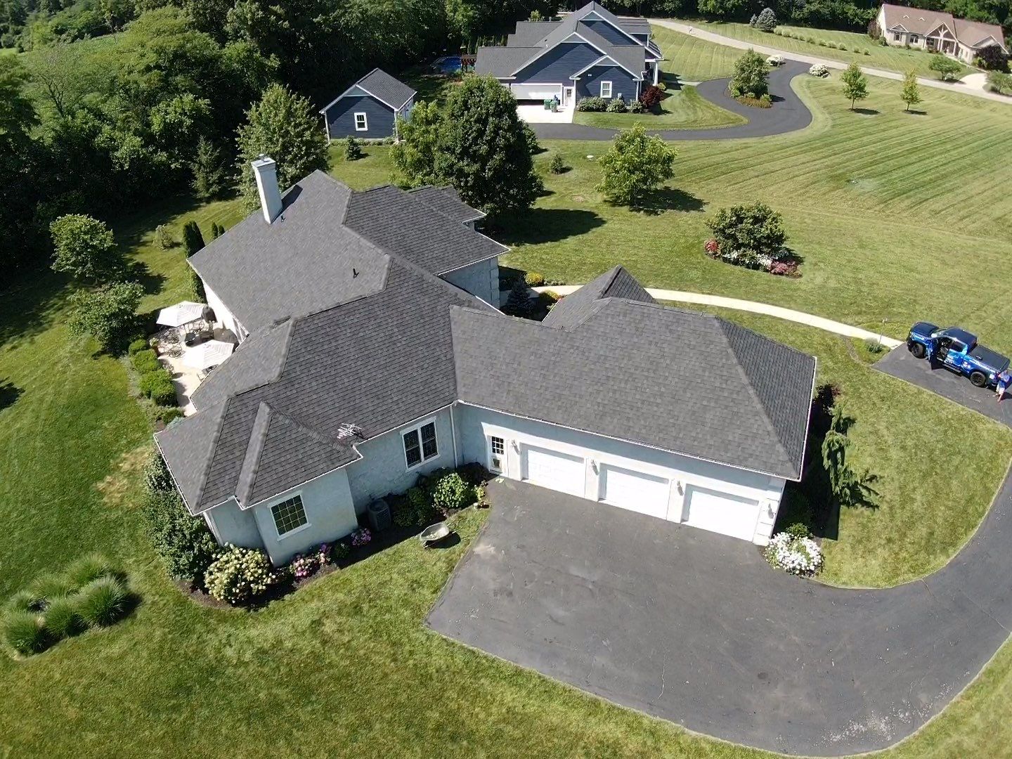 Residential Roofing Installation using Atlas Pinnacle Black Shingles by 614 Exteriors
