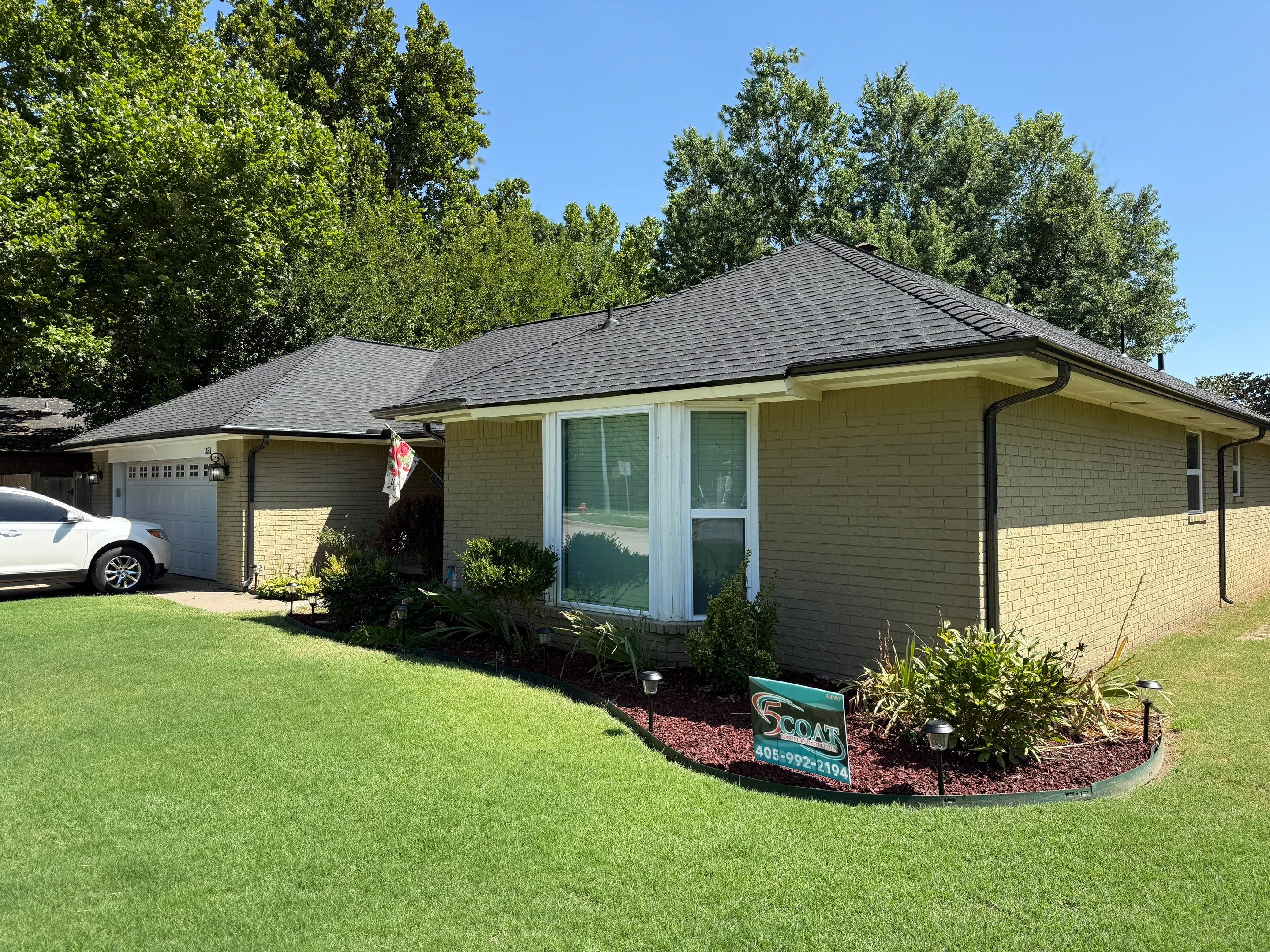 GAF Timberline HDZ Reroof - Gutters, Garage Door & Full Upgrade - Norman, OK by 5Coat Roofing & Construction