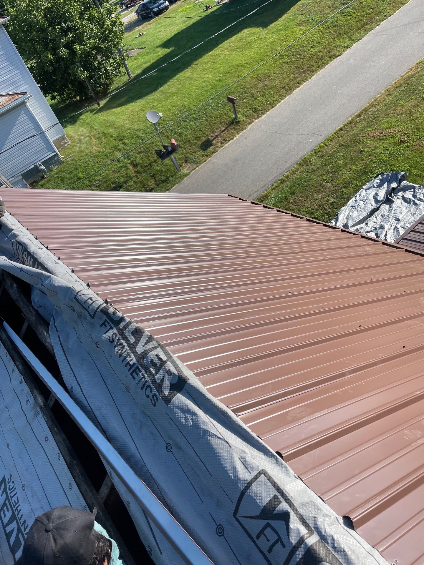 Residential Roofing Installation using Metal by Rainstoppers Roofing