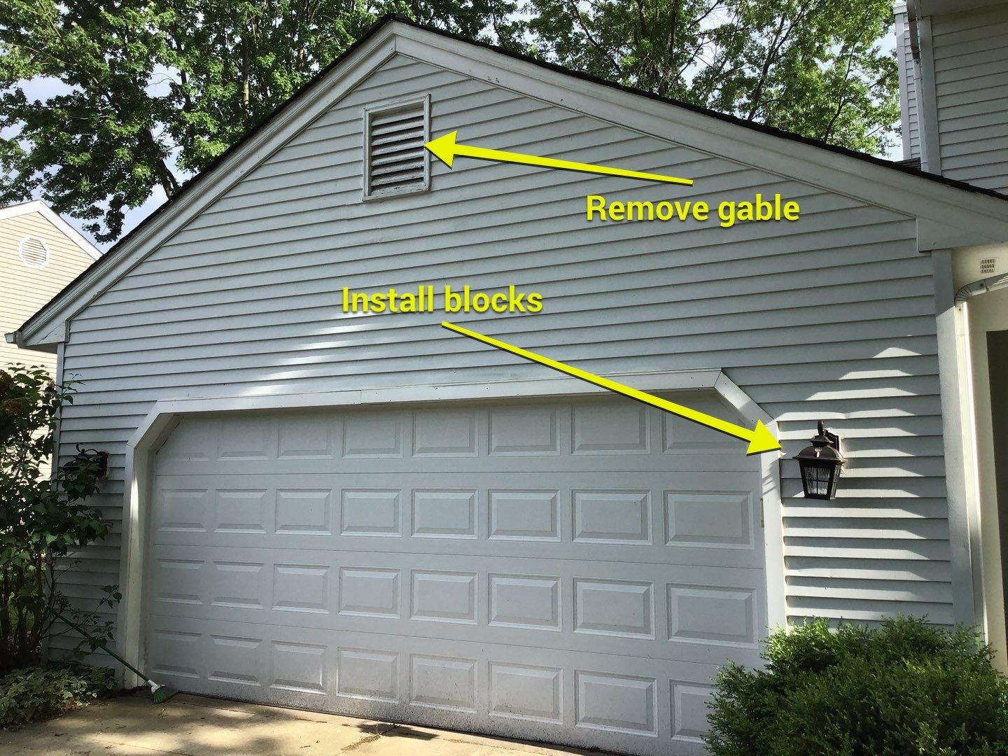 James Hardie Siding  using James Hardie Board and Batten, White by Absolute Roofing and Construction
