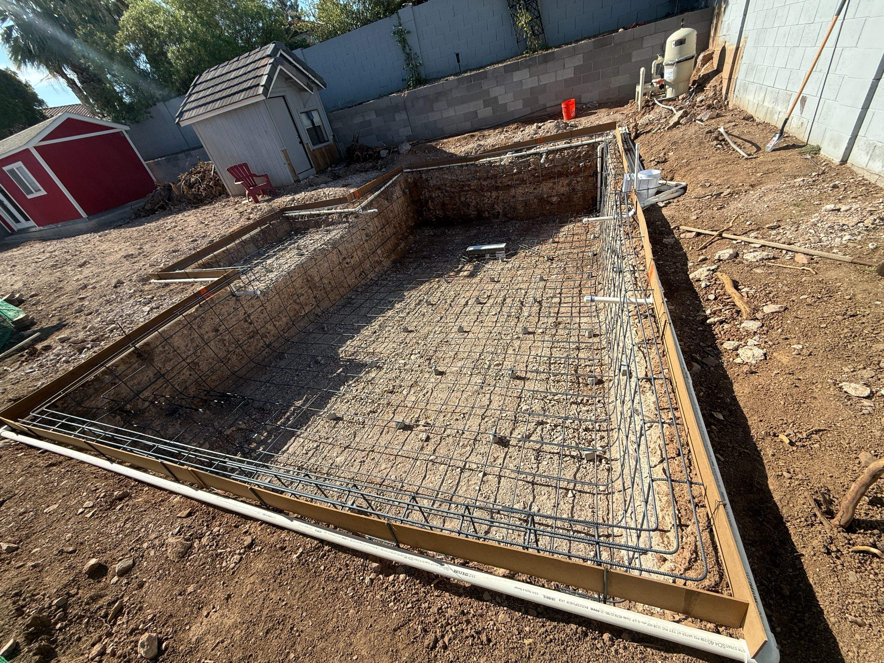 Pool build with baja step and pebble finish by Modern Pools