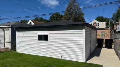 Turtle Shell gutter protection installation in Chicago, IL 60634, photograph 5