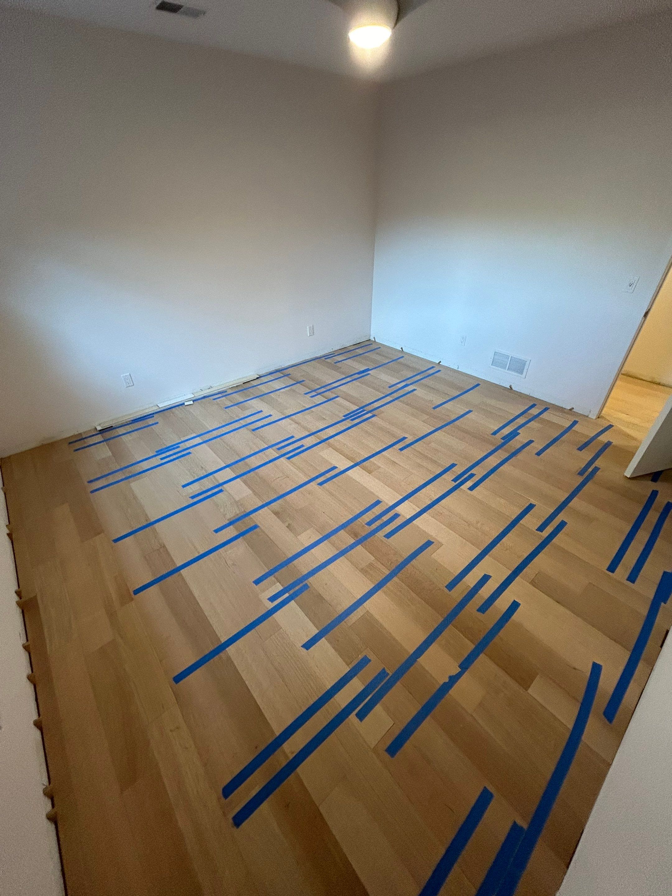 Basement Remodel using Engineered White Oak by RTBaldwin Hardwood Floors
