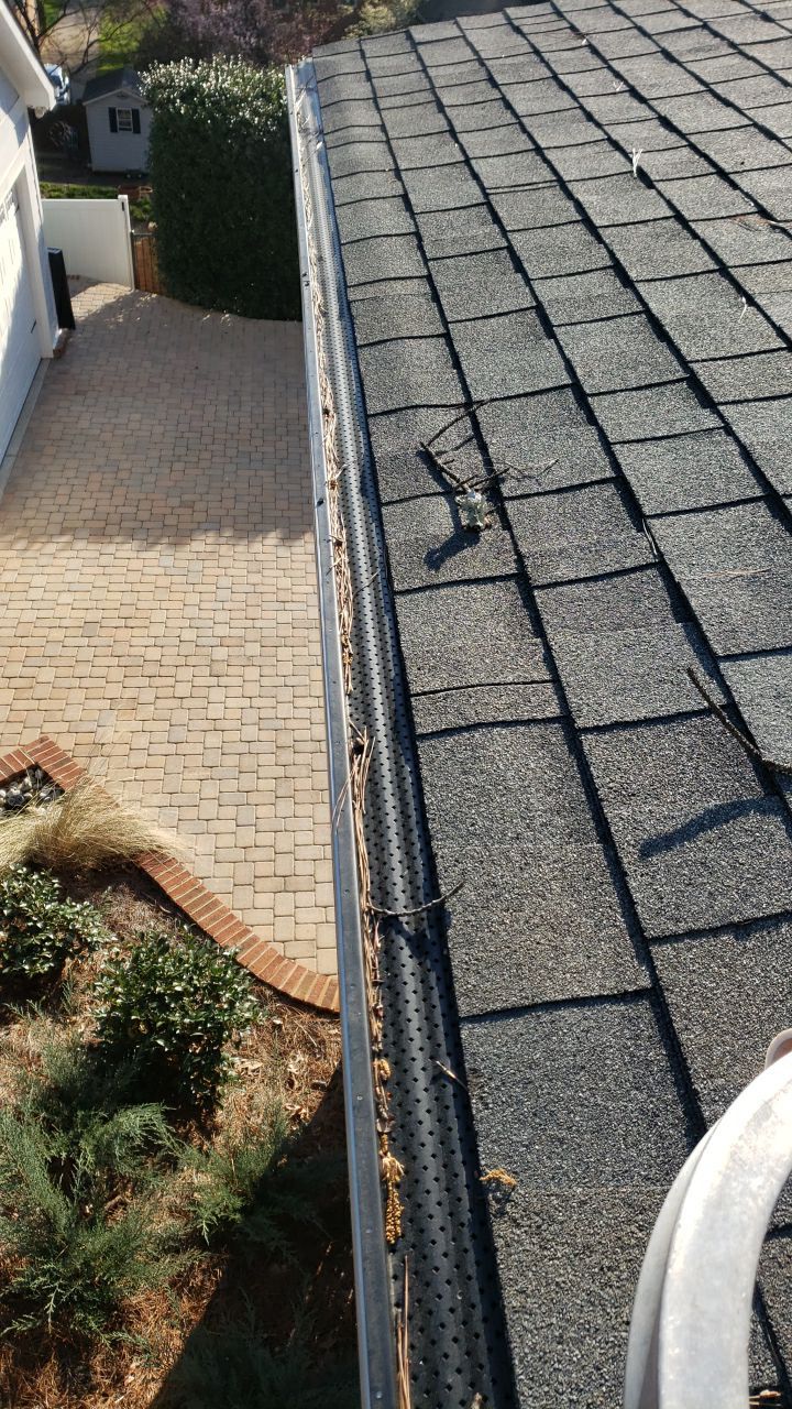 Gutter Cleaning using water by Power Wash Masters LLC