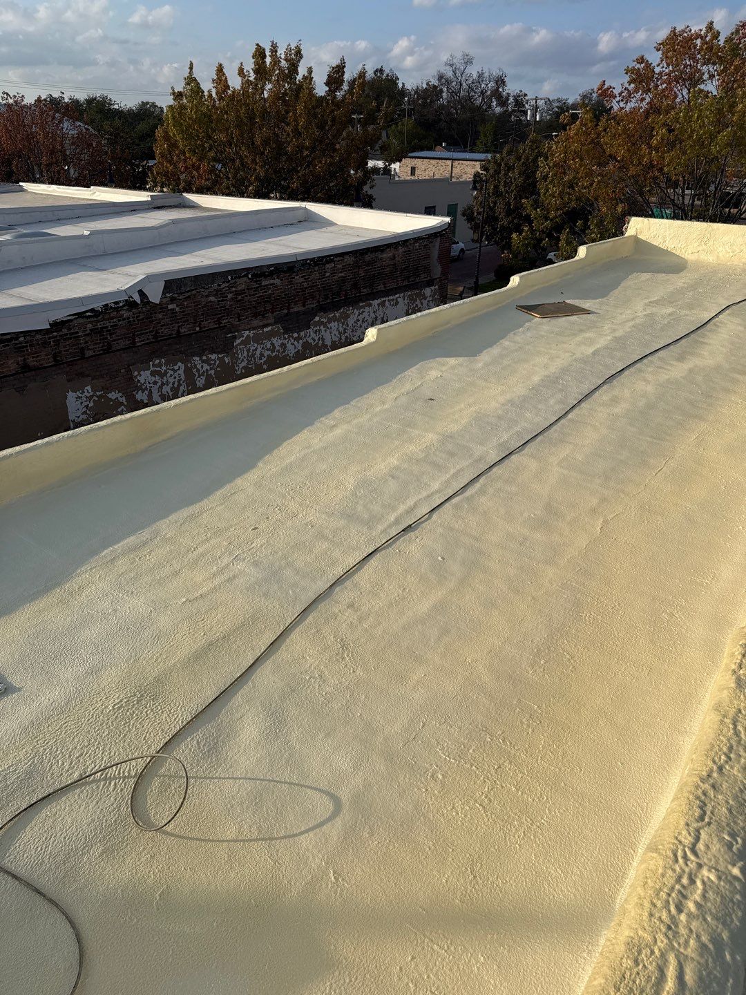 Heath Hyde, P.C. – Commercial Foam Roof Restoration in Sulphur Springs, TX by All Star Roofing LLC