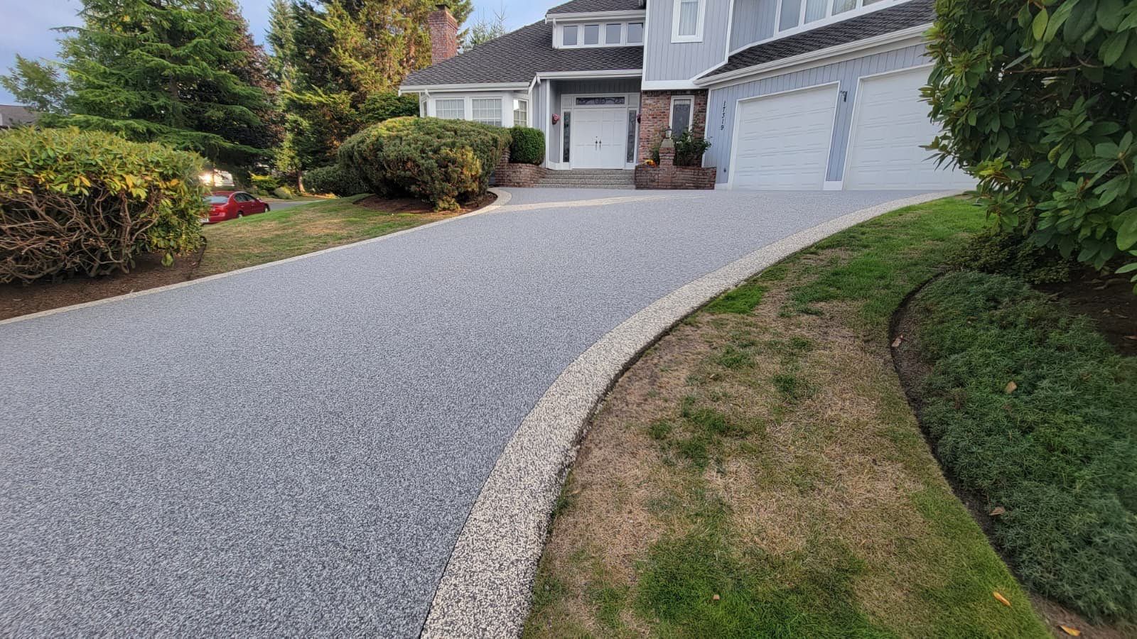 Elegant Driveway and Patio in Palazzo Vuba Stone by Concrete Coating Experts Inc.