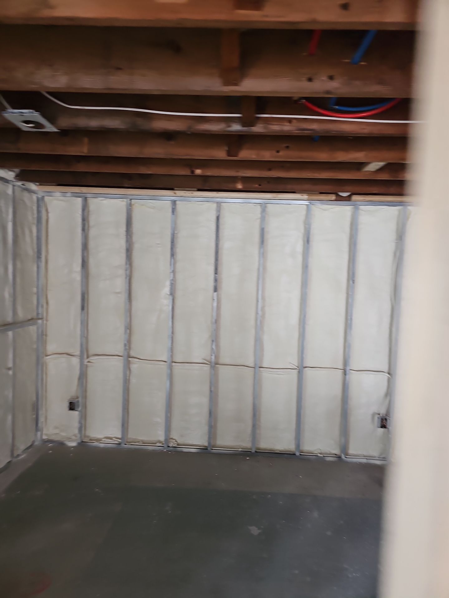 Basement Exterior Walls using Closed Cell Spray Foam by NYS Foam & Energy