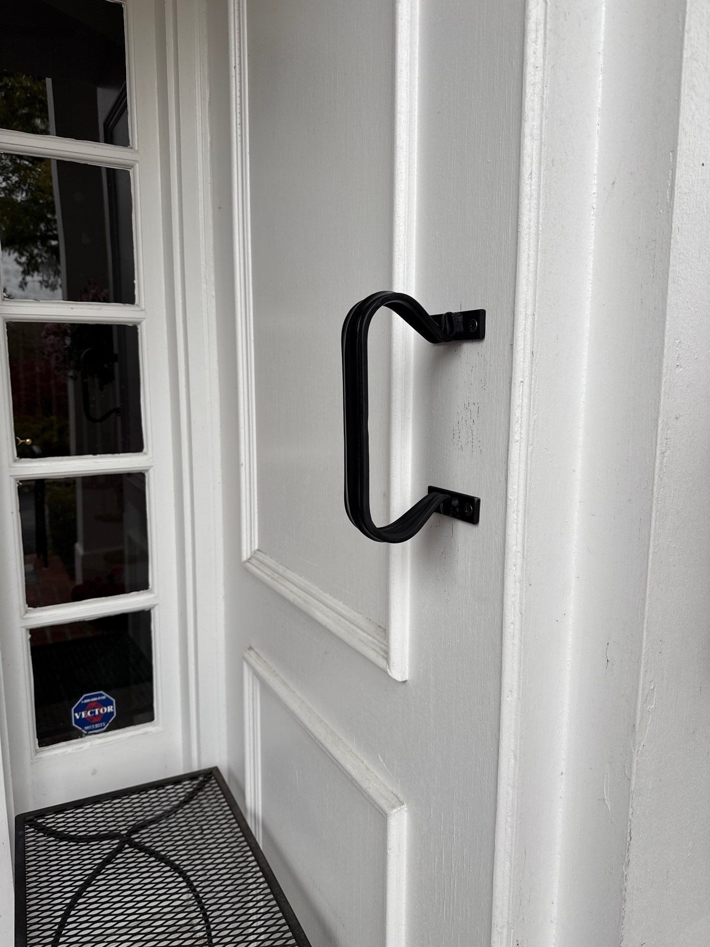 Wrought Iron Handrail Installation for Potomac Brick Entryway by Capitol Iron Works