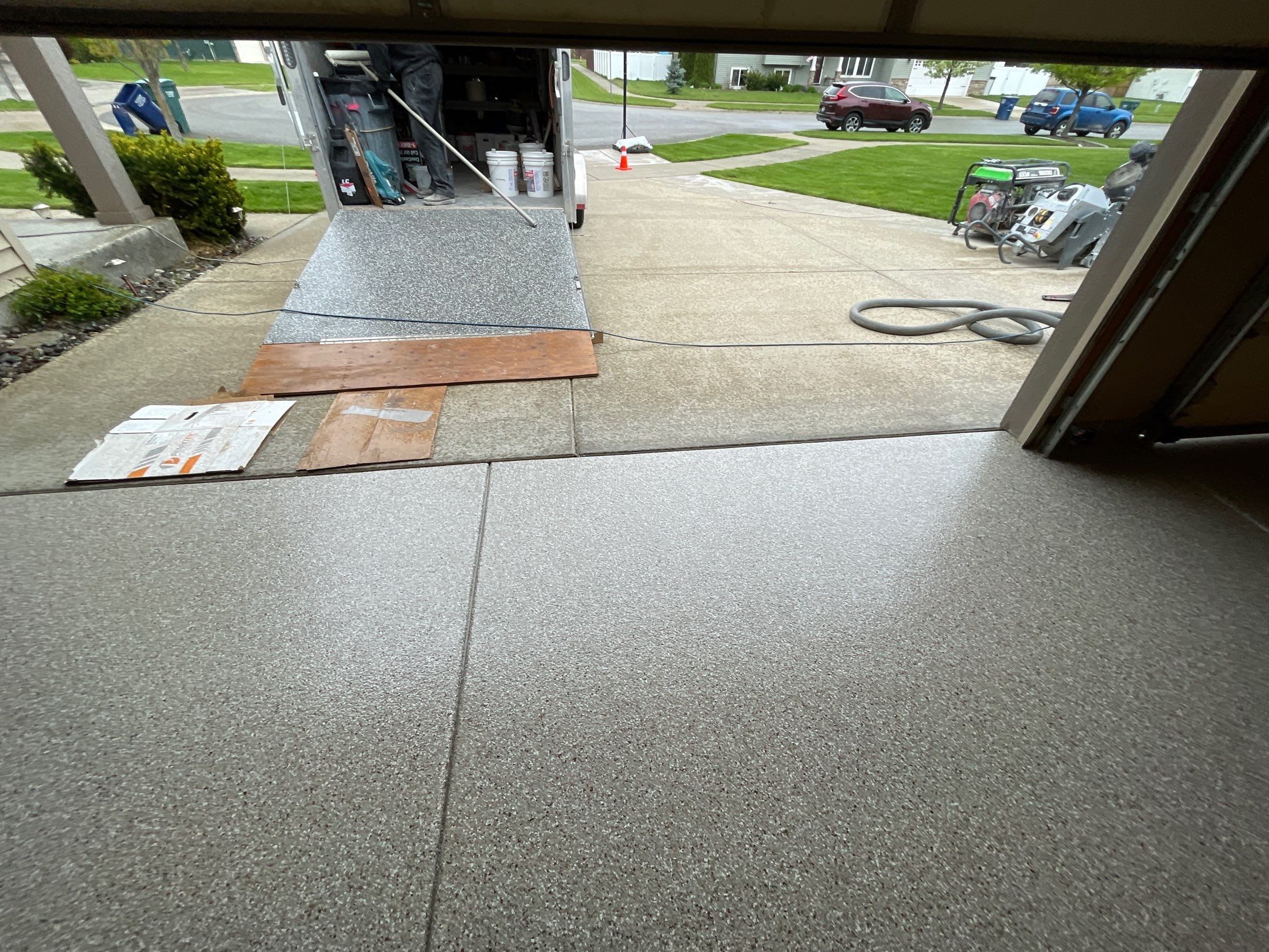 Garage Transformation using Pebble Beach and Front Porch using Greystone by Croc Coatings, LLC