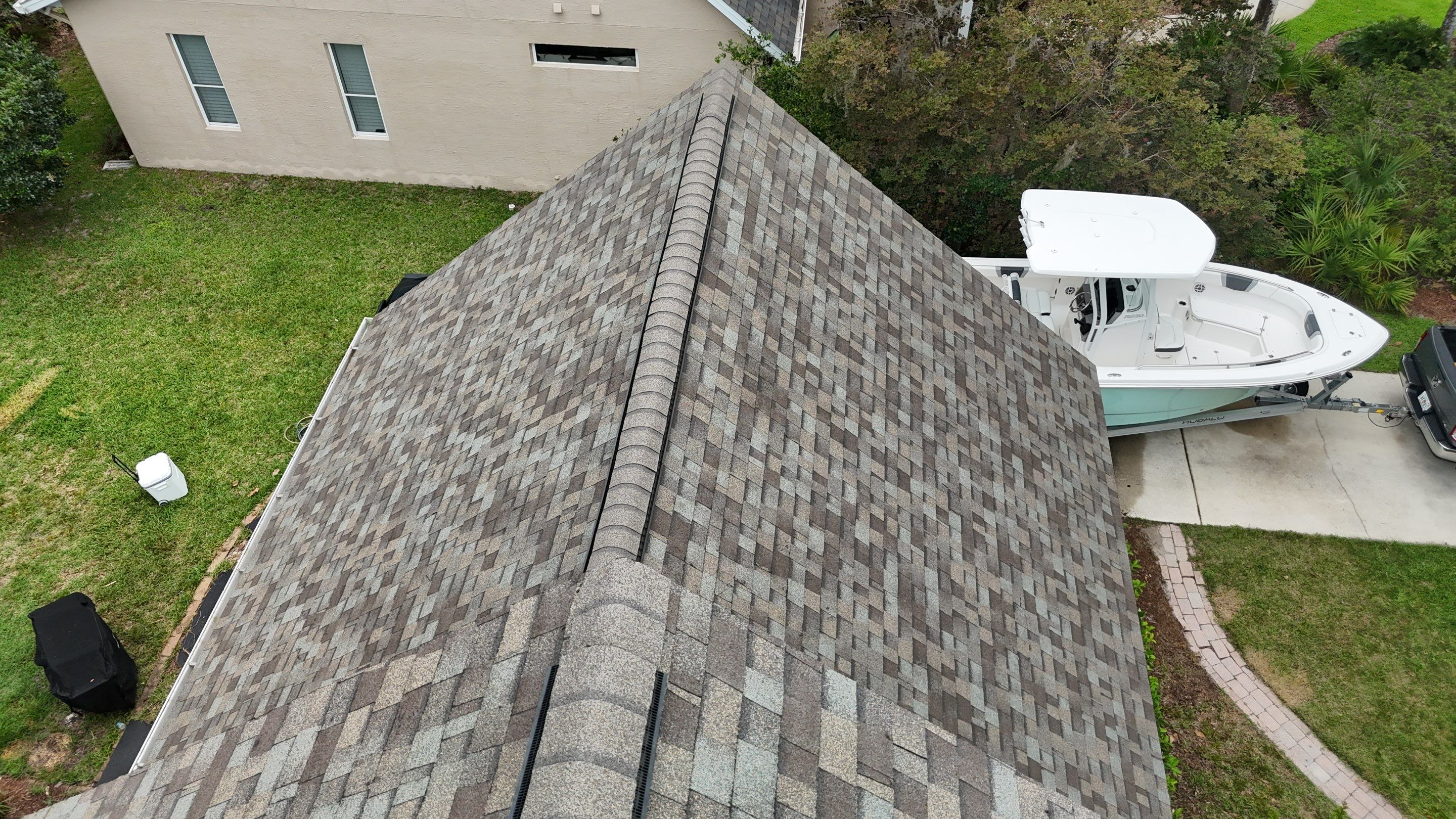 Full Residential Roofing Installation for Multi-Gabled Flagler Beach Home by Trinity Restoration and Roofing LLC