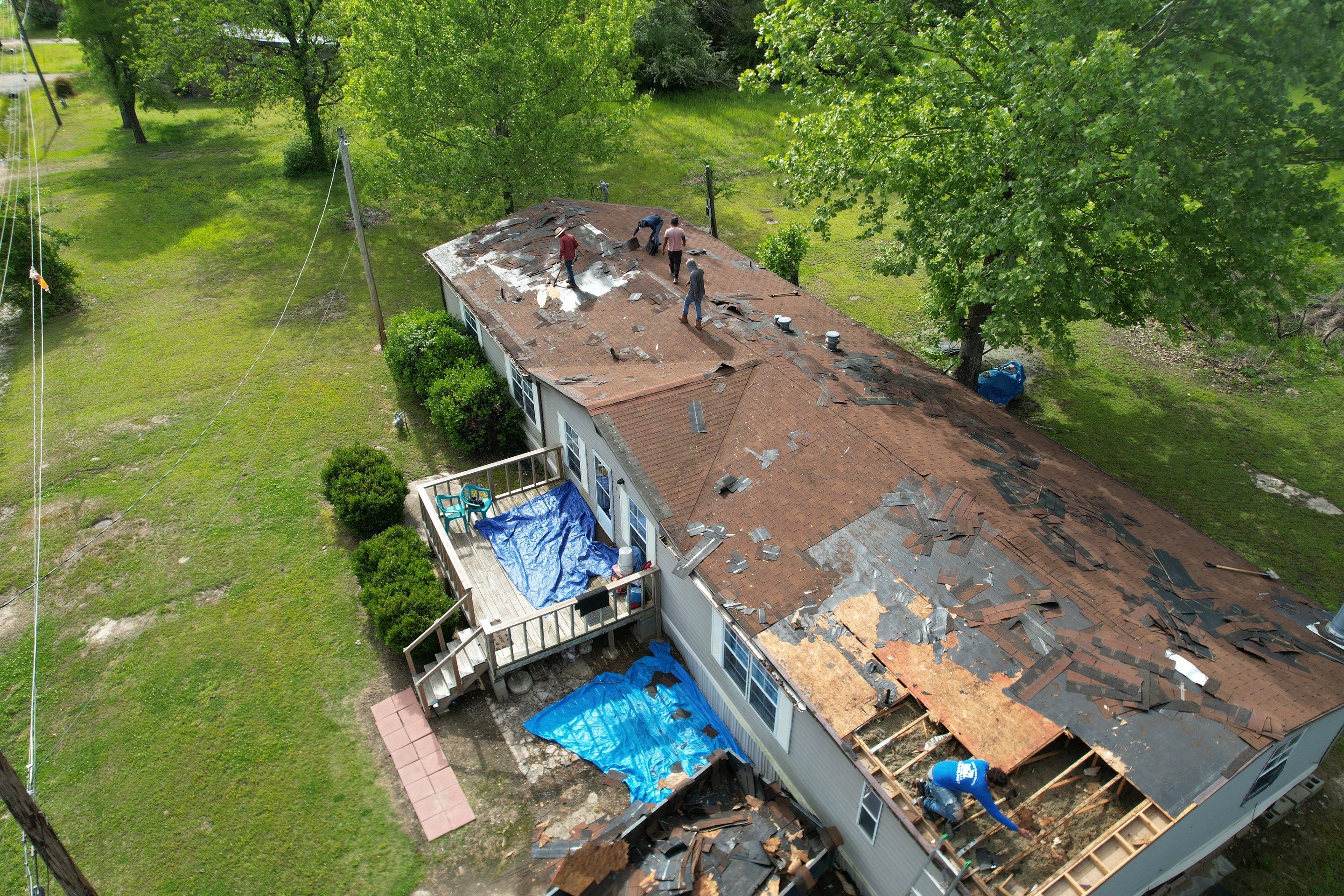 Storm Restoration Reroof: 25 Year 3-Tab Shingle by Hostetler Roofing