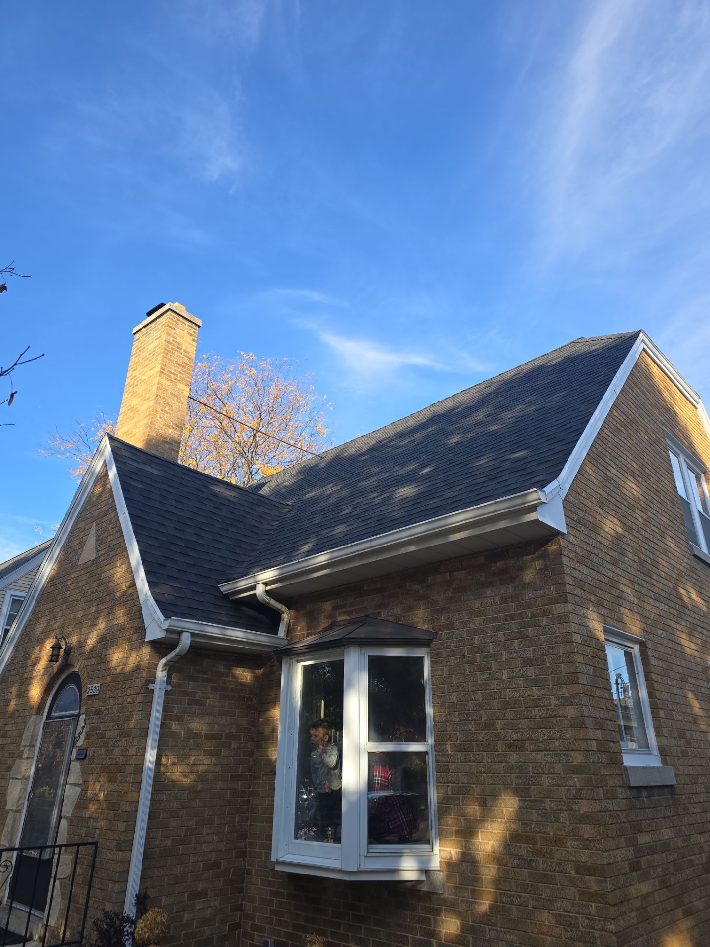 House, Garage, and Skylight Roof Replacement with GAF HDZ Charcoal Shingles and Gutter Protection by Gellings Roofing & Siding
