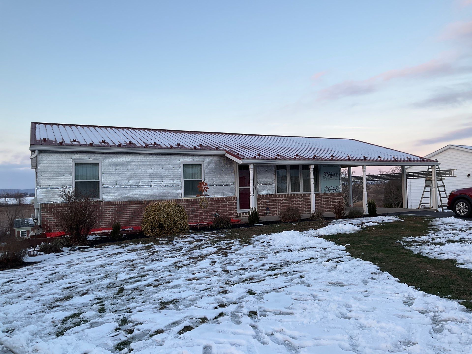 Vinyl Siding Replacement and Patio Door Installation in Elizabethville by Esh Builders