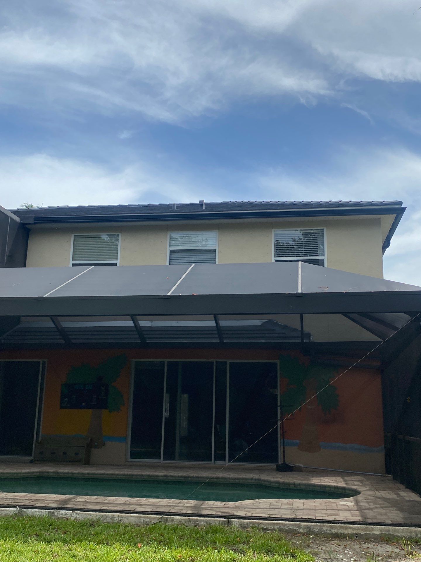 Black Seamless Gutters for Modern Homes in Osprey FL by Gutter Professors