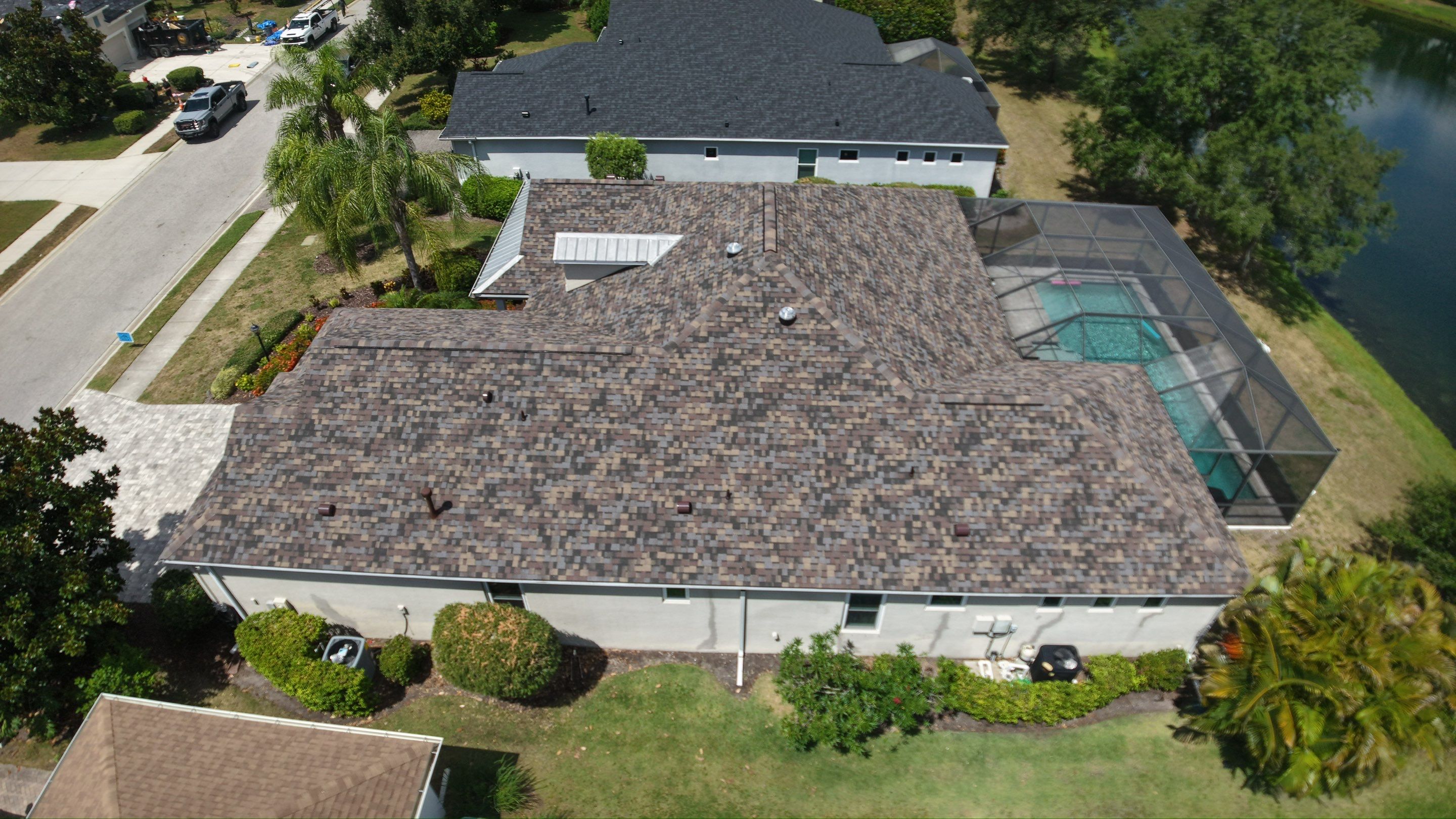 Architectural Summer Harvest Asphalt Shingle Roof Replacement in Bradenton, Florida by Trinity Restoration and Roofing LLC