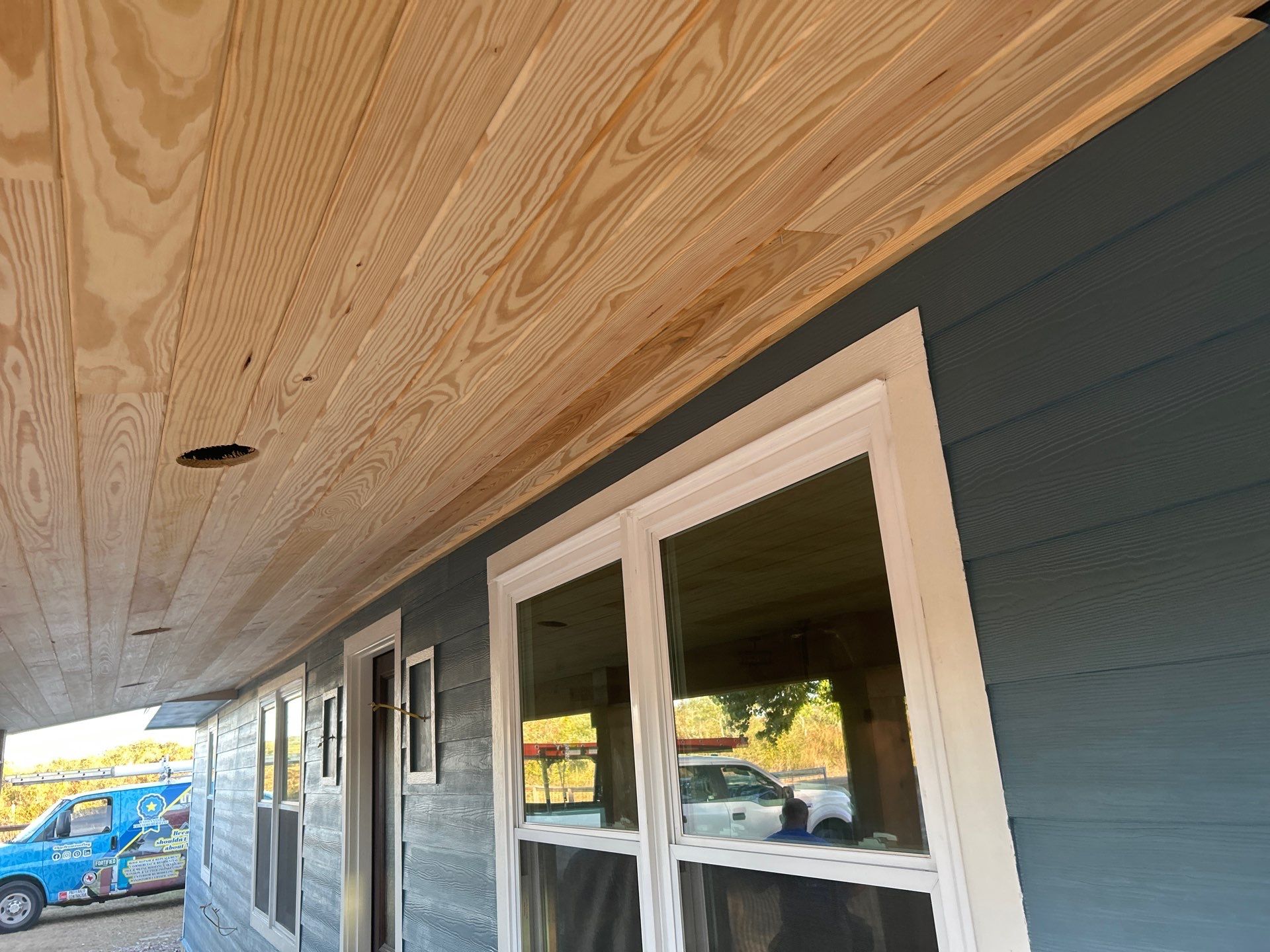 Customized Cabin by Bayfront Roofing and Construction