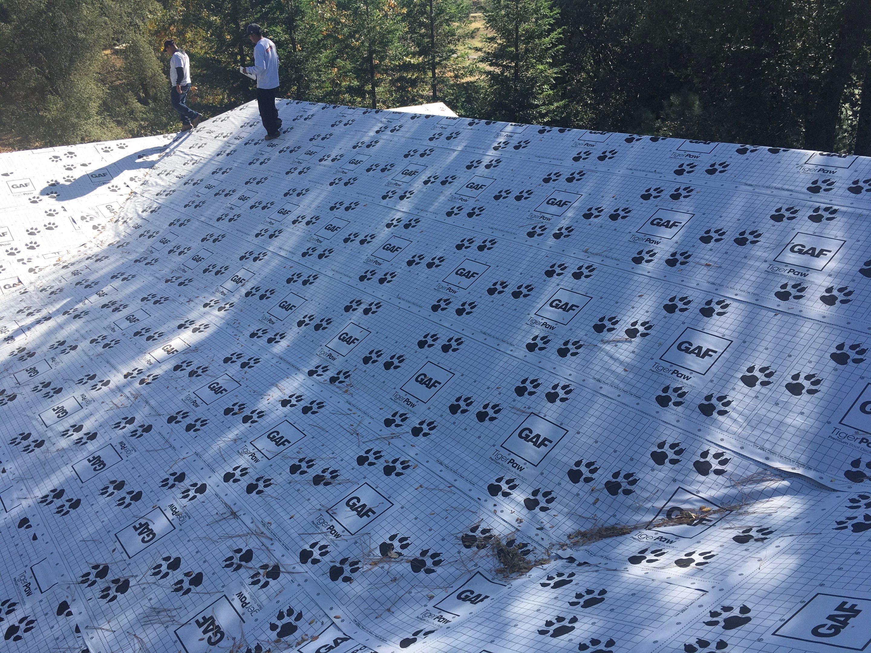 Metal roofing installation using Standing seam metal roofing system by Straight Edge Roofing Inc