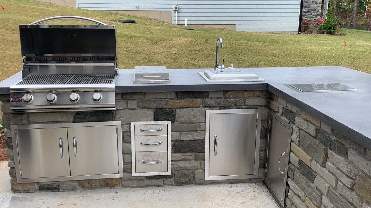 Outdoor Kitchen on Lake Keowee by Xtreme Concrete Services
