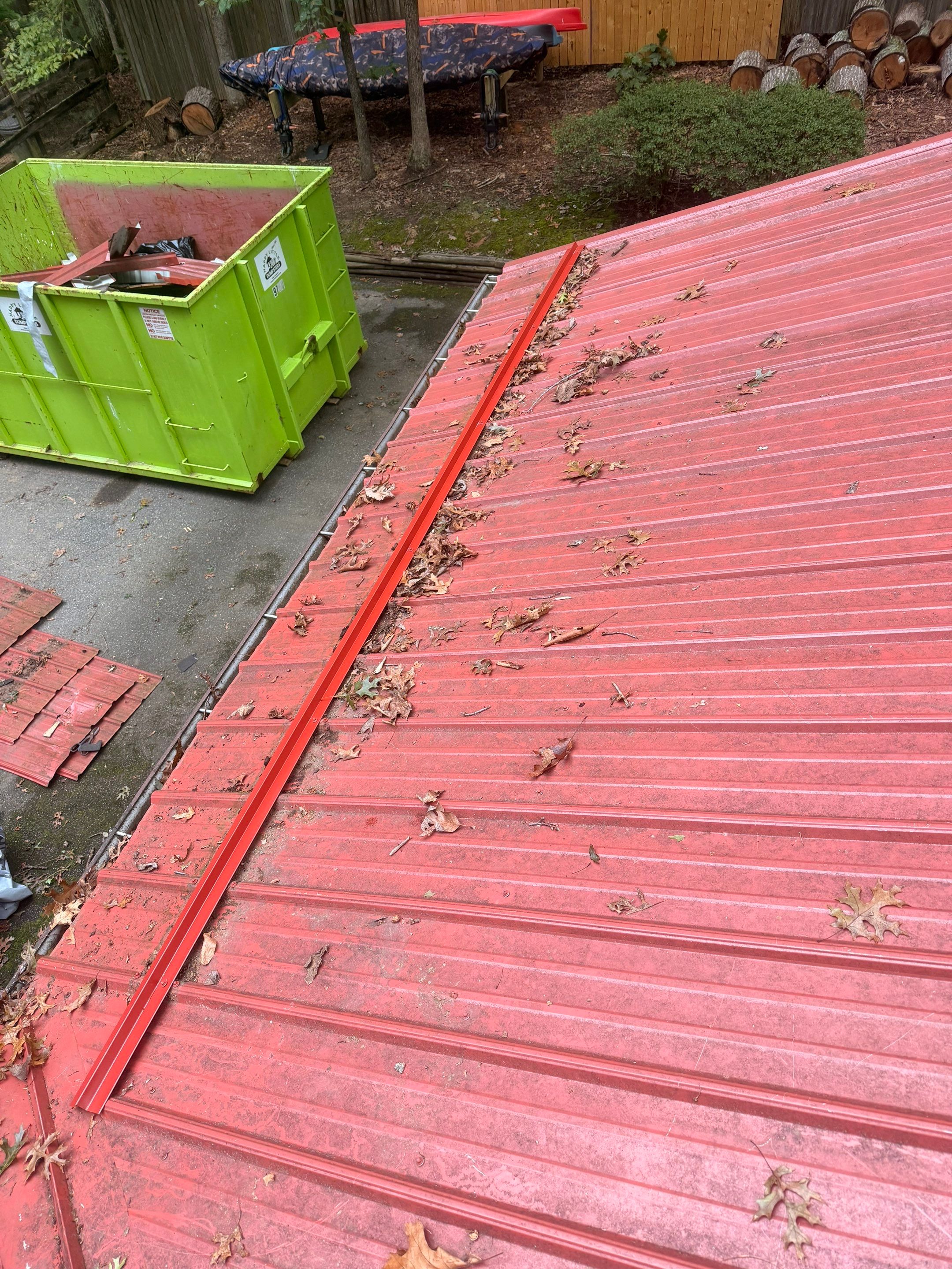 Red Metal Roof Restoration and Wood Fascia Replacement in Barboursville by Cade Construction