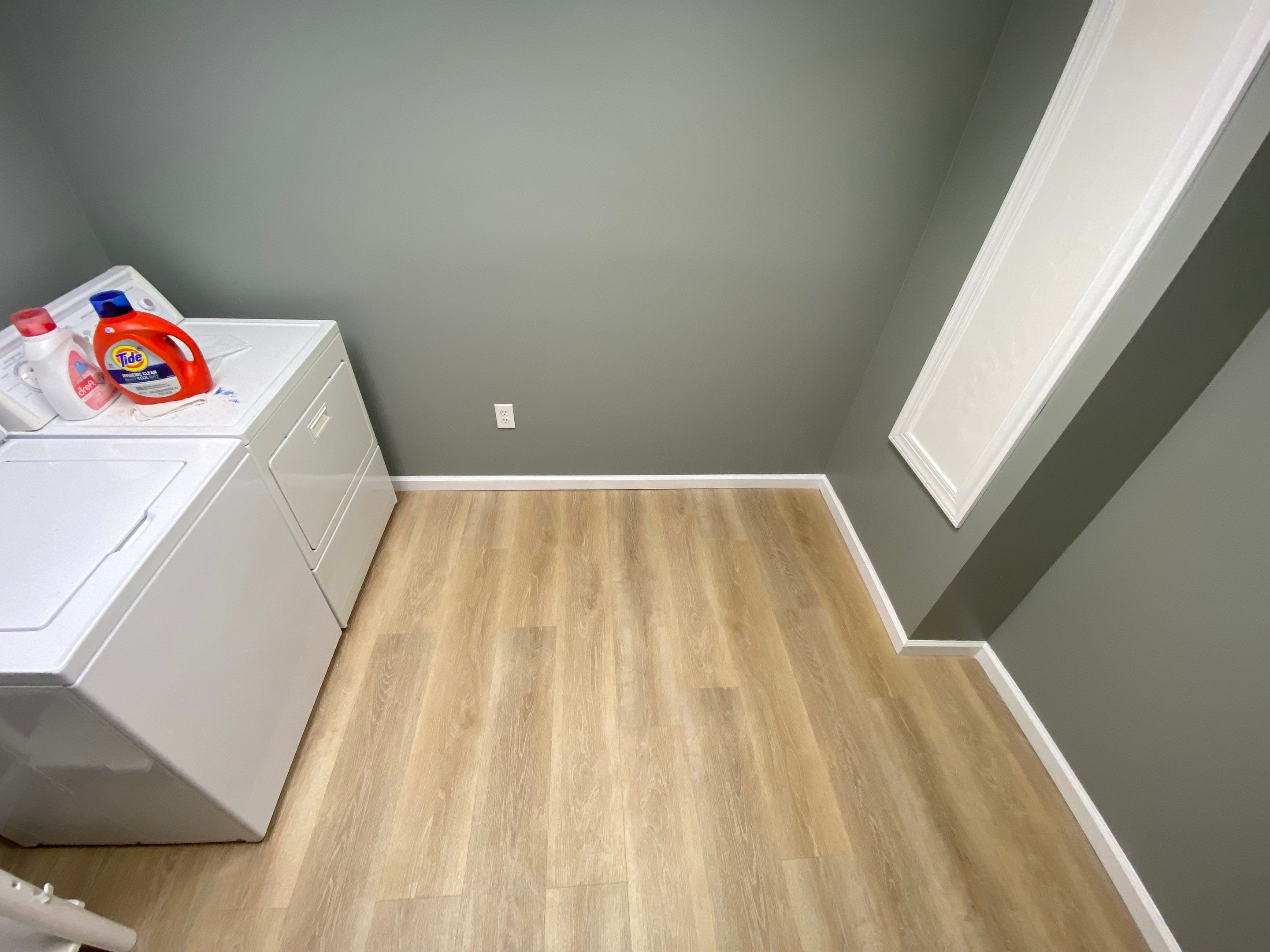 Laundry Room Redmodel using Lifeproof Luxury Vinyl Plank Flooring by The Smet Companies, LLC