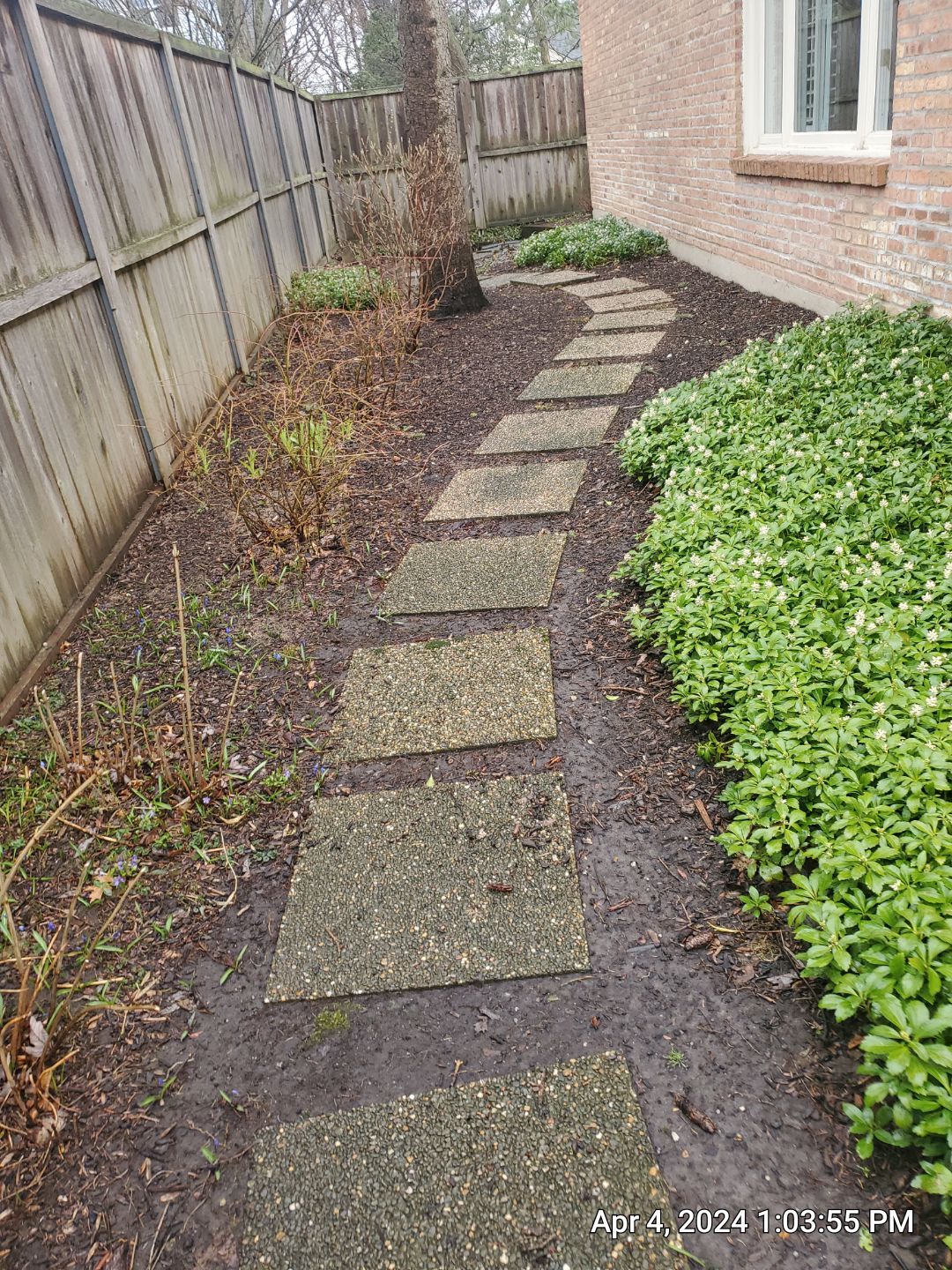 Flagstone stepper cleaning by Northern Power Washing LLC.