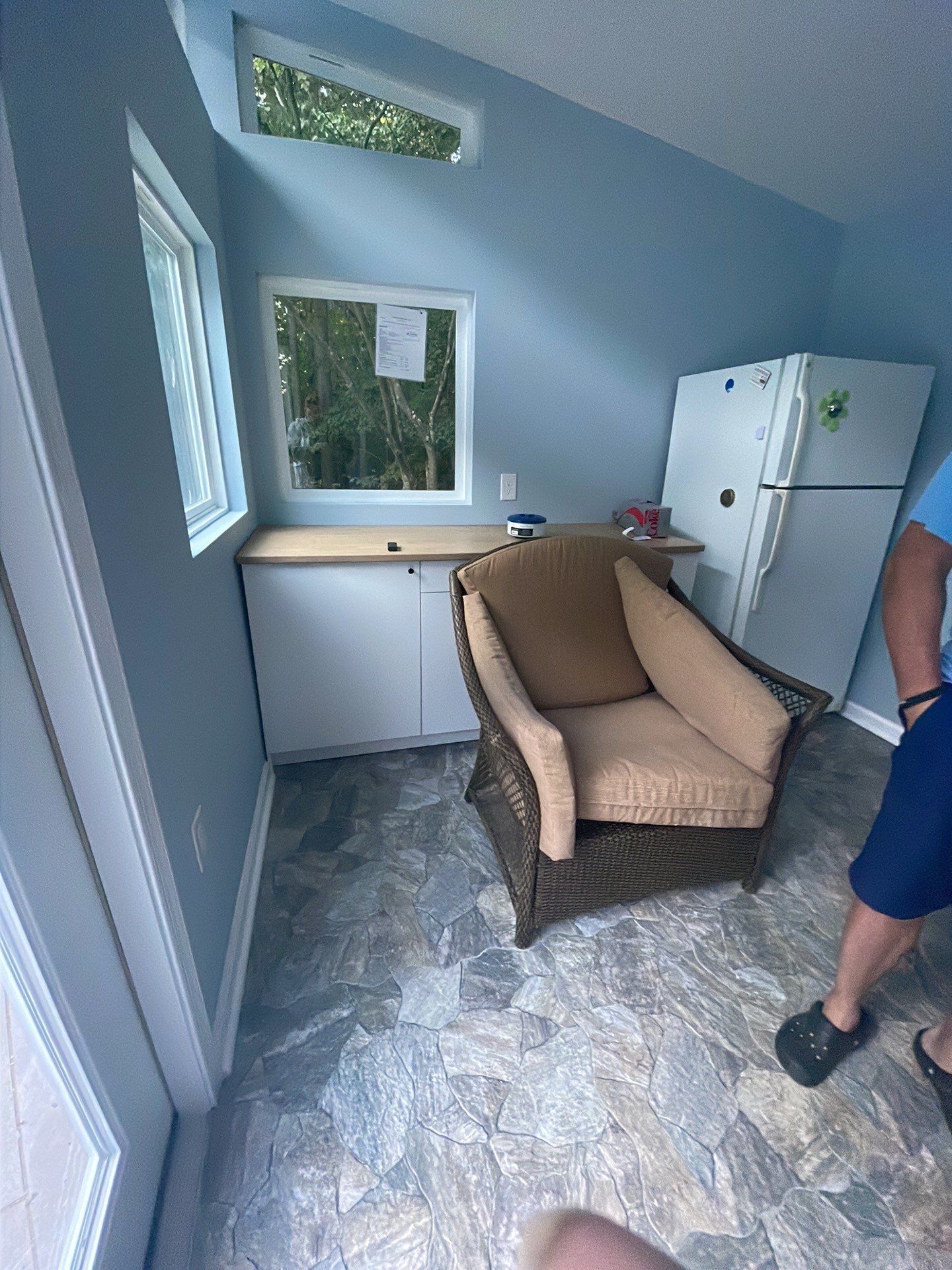 Pool Surround remodel with retaining walls, new waterfall and water slide by Fairfax Contractors, LLC