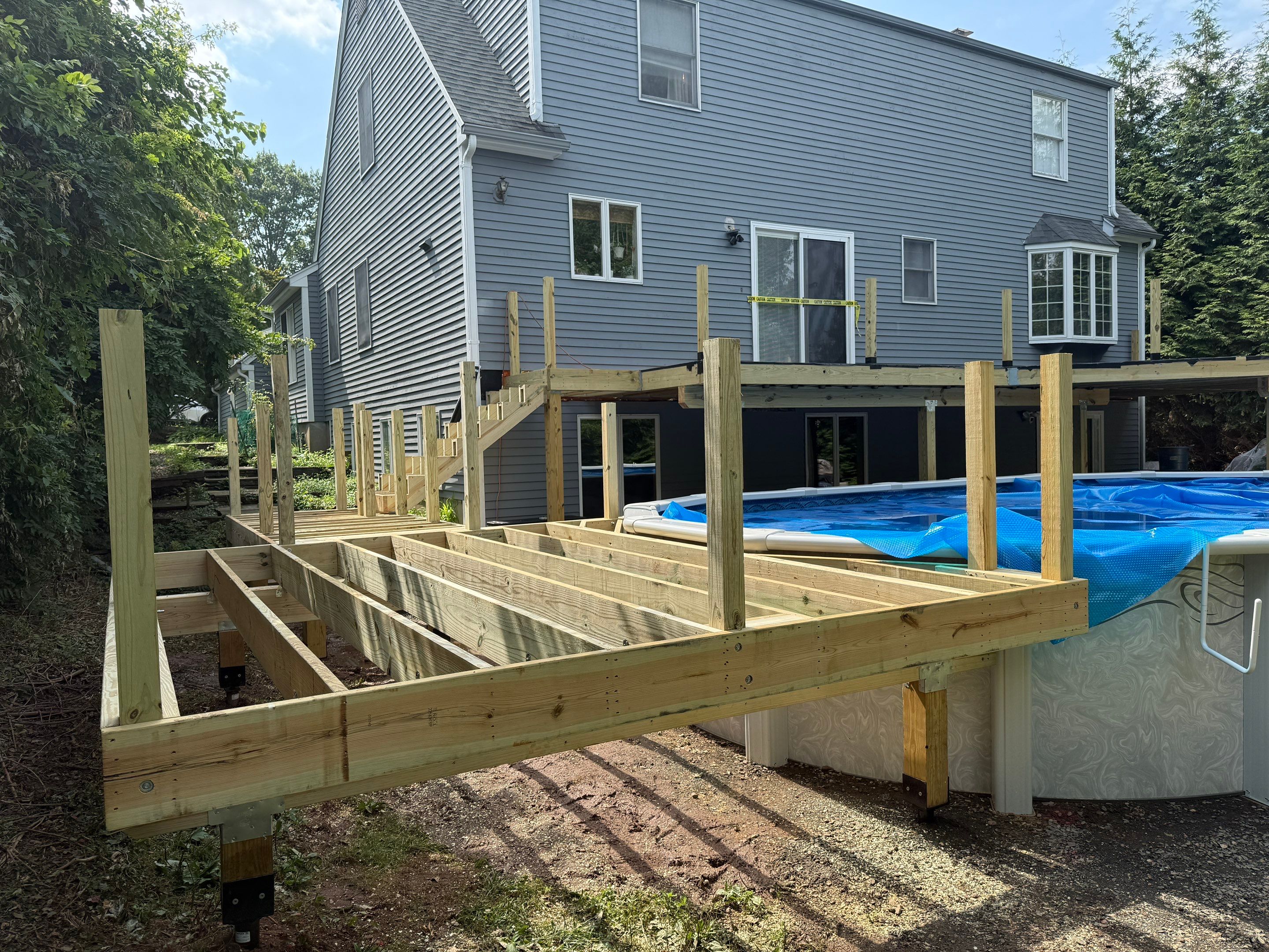 Complete replacement of original deck and addition of new pool deck by DiGiorgi Roofing and Siding Inc