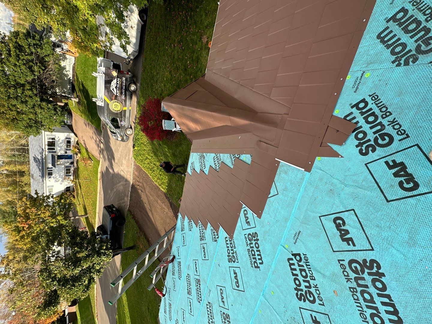 Residential Roofing Installation using Wakefield Bridge Steel Shingle by Ideal Steel by Artisan Roofing & Home Improvements Inc.