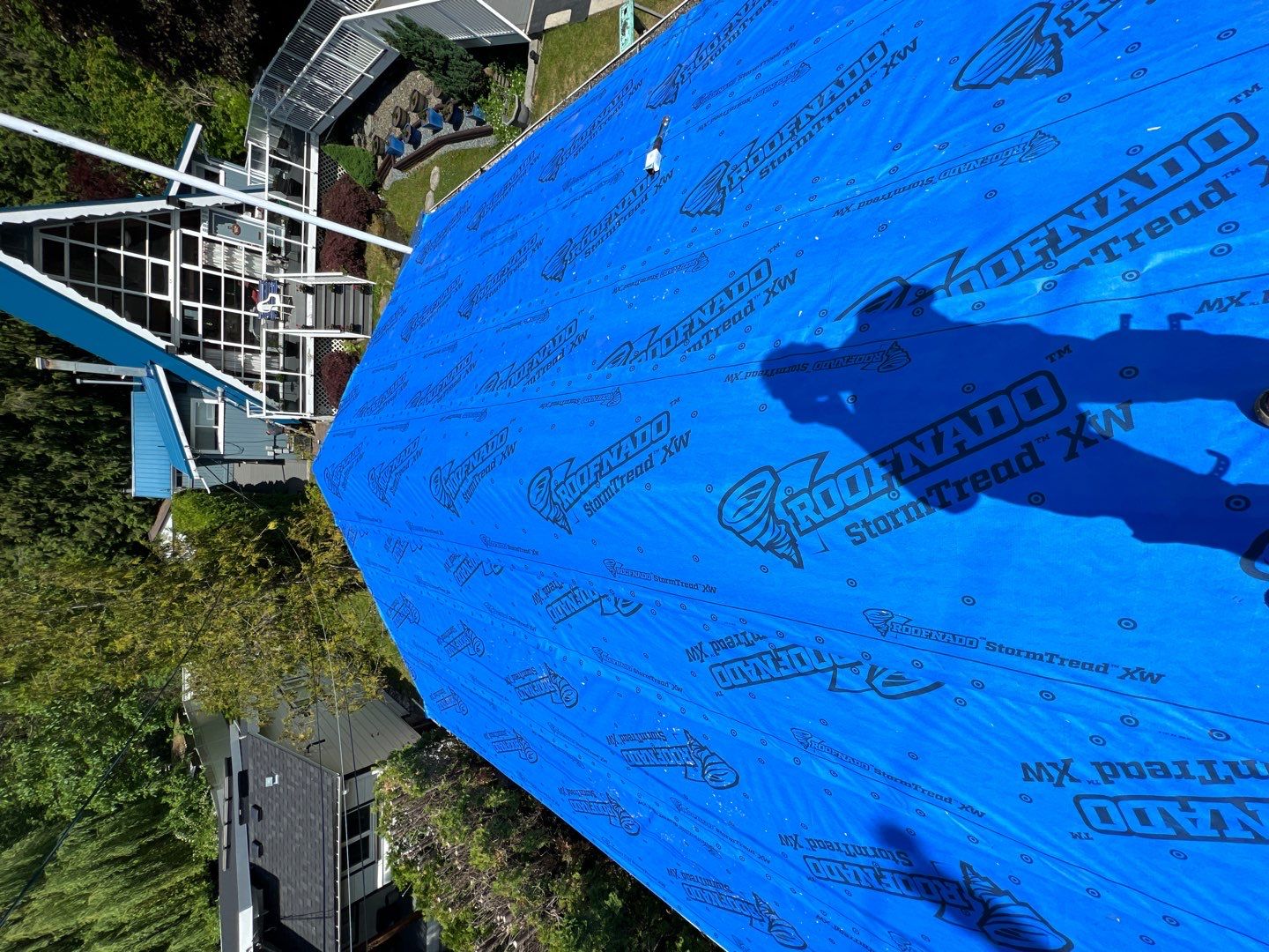 Residential ReRoofing Installation using Duraclad 26ga by Top Notch Roofing Inc