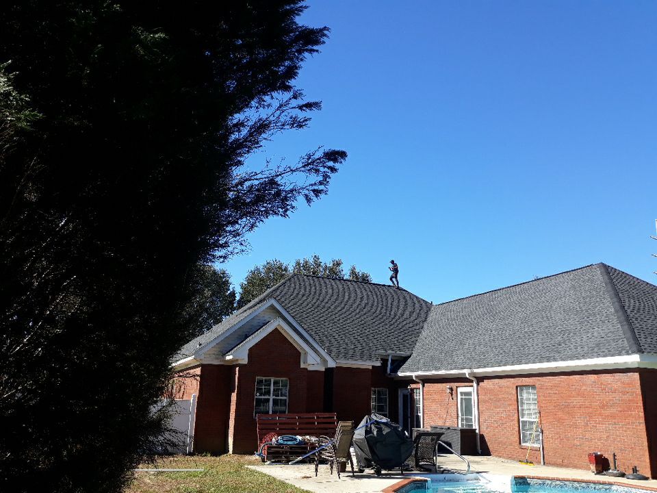 Residential Roofing Installation using Roof Replacement by American Roofing & Construction LLC