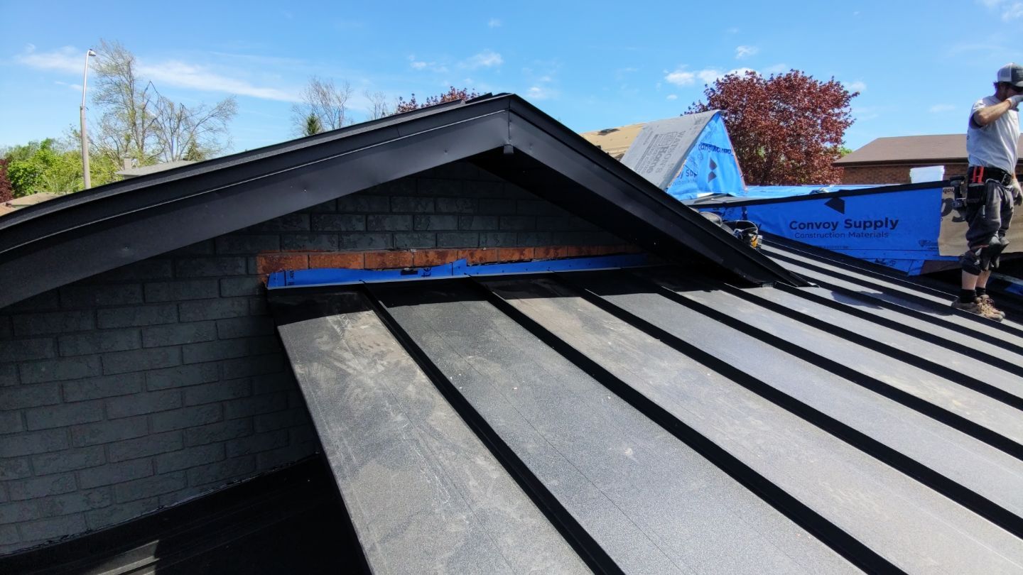 Residential Roofing Installation using 16" Standing Seam Panels by Jay Carter Roofing & Sheet Metal